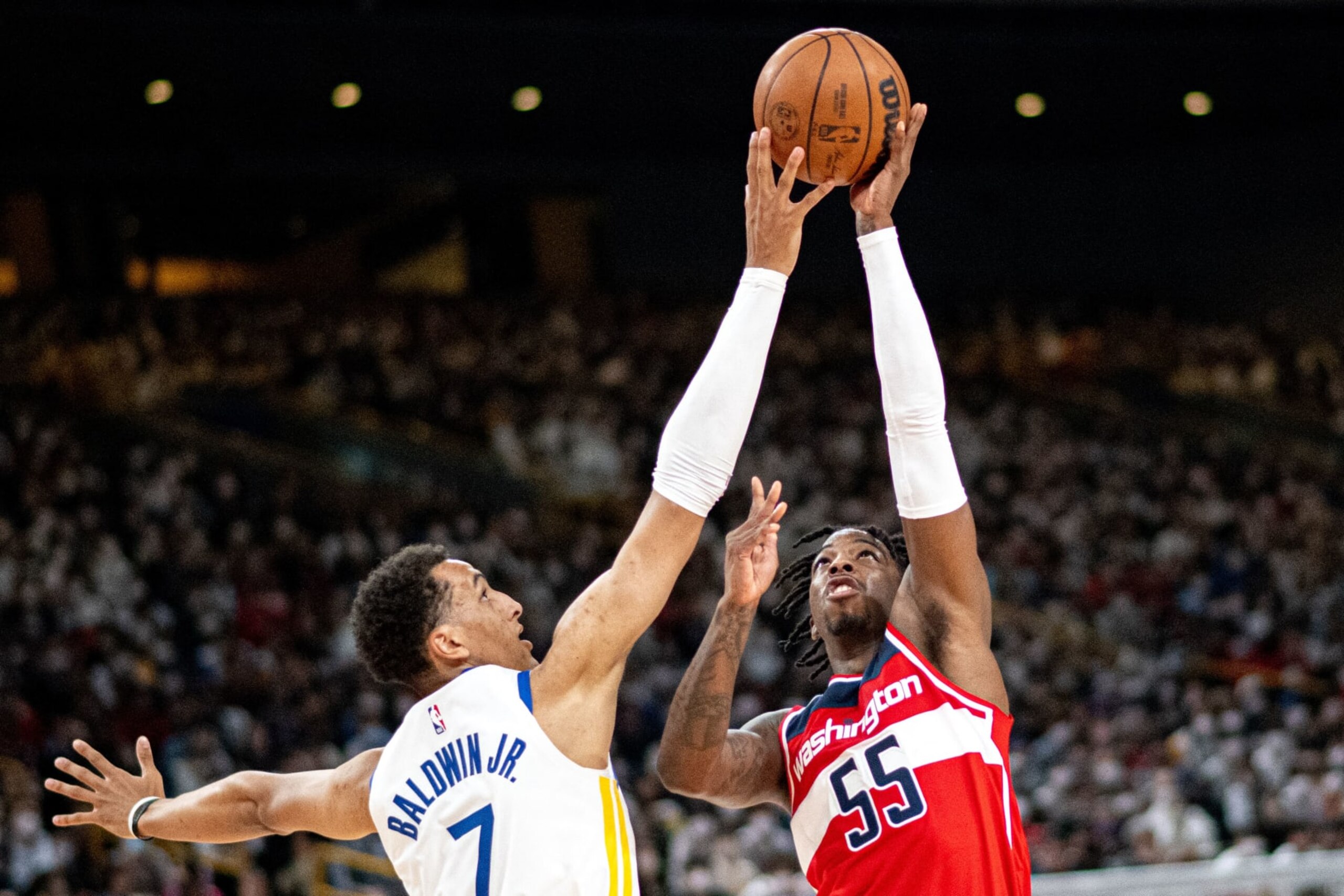 Golden State Warriors' Patrick Baldwin Jr. fights for the ball with Washington Wizards' Delon Wright during the NBA Japan Games 2022 pre-season basketball game between the Golden State Warriors and Washington Wizards at the Saitama Super Arena in Saitama on October 2, 2022. (Photo by Philip FONG / AFP) (Photo by PHILIP FONG/AFP via Getty Images)