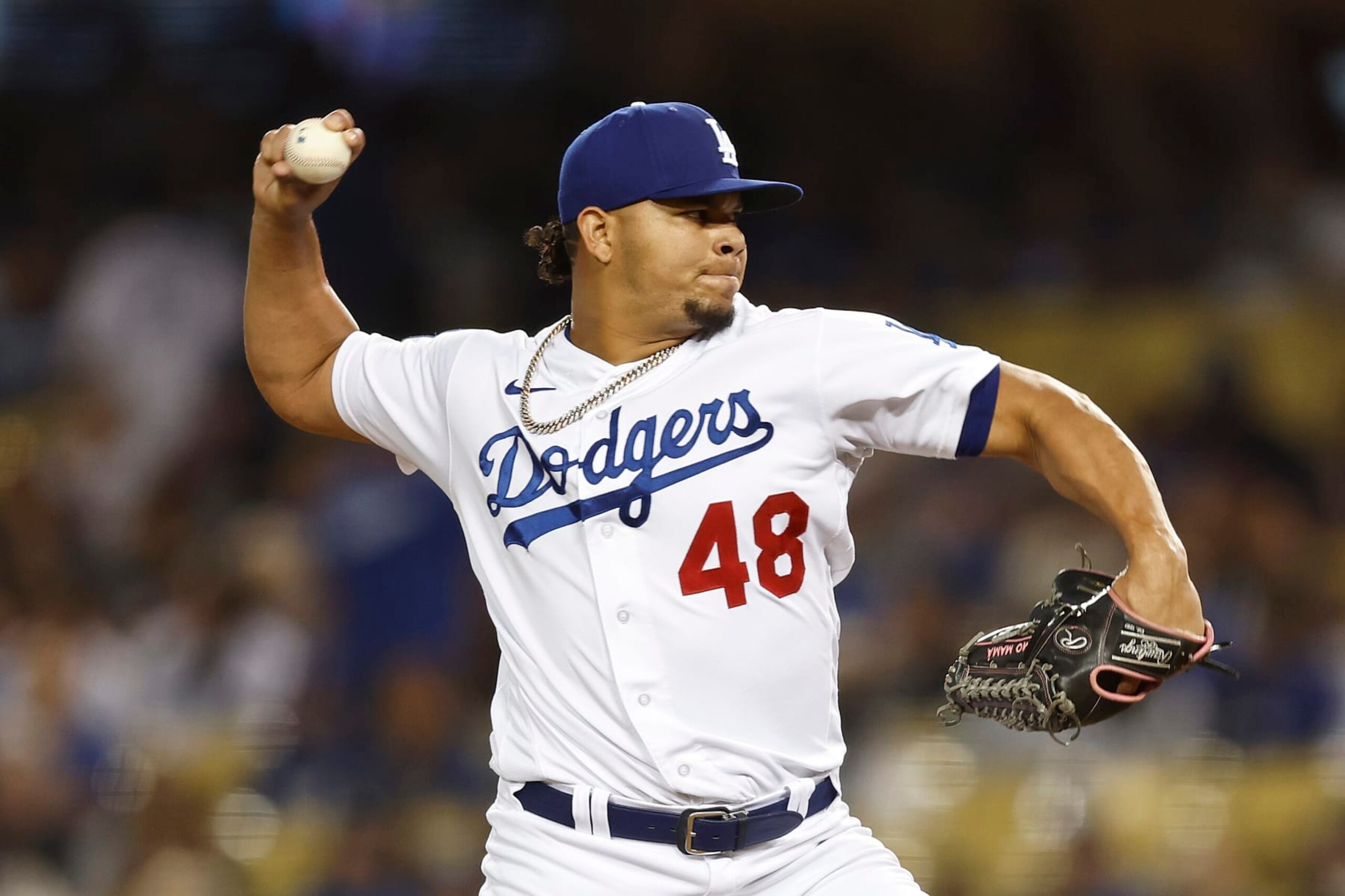 LOS ANGELES, CALIFORNIA - OCTOBER 01: Brusdar Graterol #48 of the Los Angeles Dodgers pitches against the Colorado Rockies during the ninth inning at Dodger Stadium on October 01, 2022 in Los Angeles, California. (Photo by Michael Owens/Getty Images)