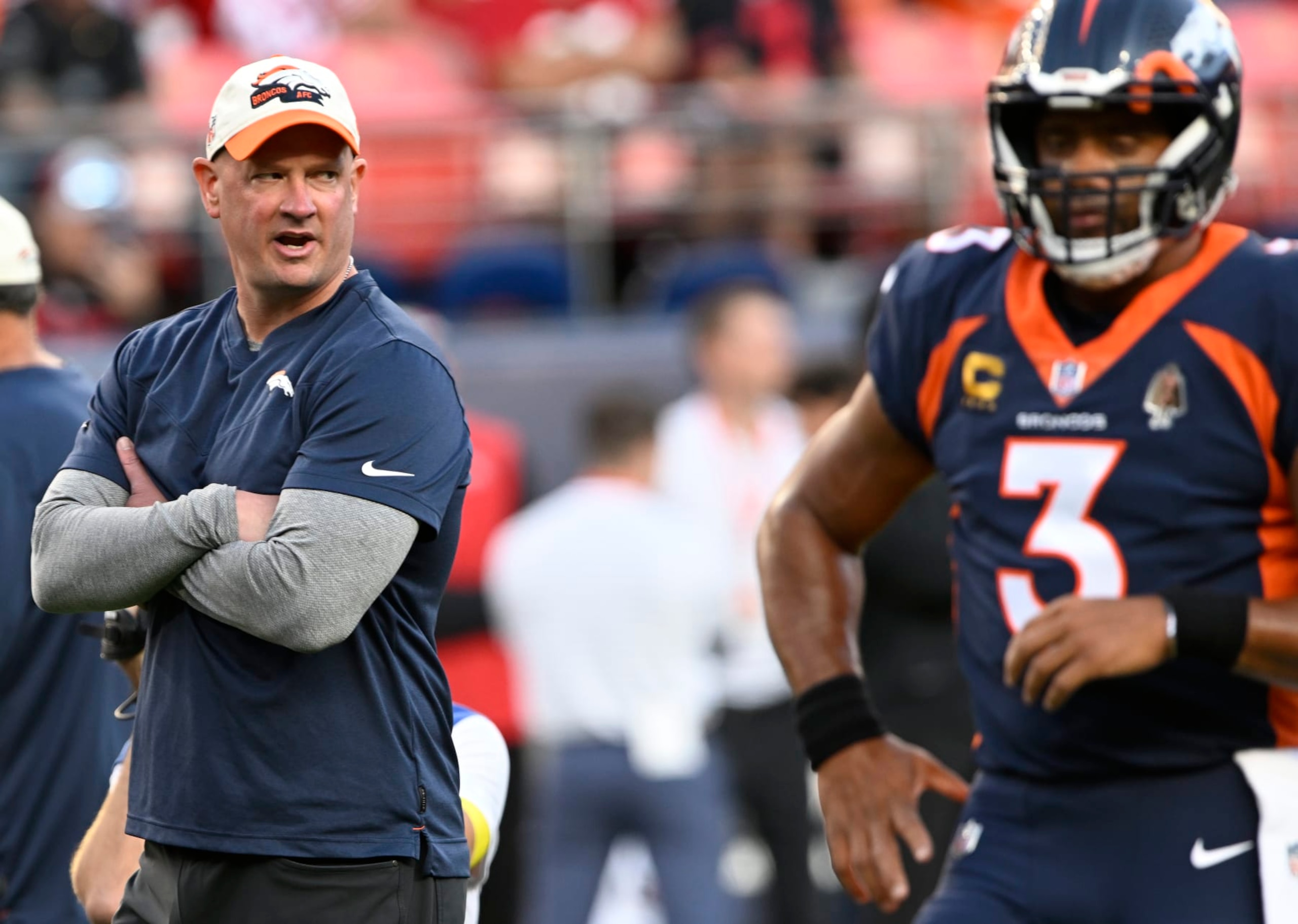 DENVER, COLORADO - SEPTEMBER 25: Denver Broncos head coach Nathaniel Hackett and Denver Broncos quarterback Russell Wilson (3) takes the field before the start of the game at Empower Field on September 25, 2022 in Denver, Colorado. The Denver Broncos took on the San Francisco 49ers during week 3 of the NFL season. (Photo by  RJ Sangosti/MediaNews Group/The Denver Post via Getty Images)