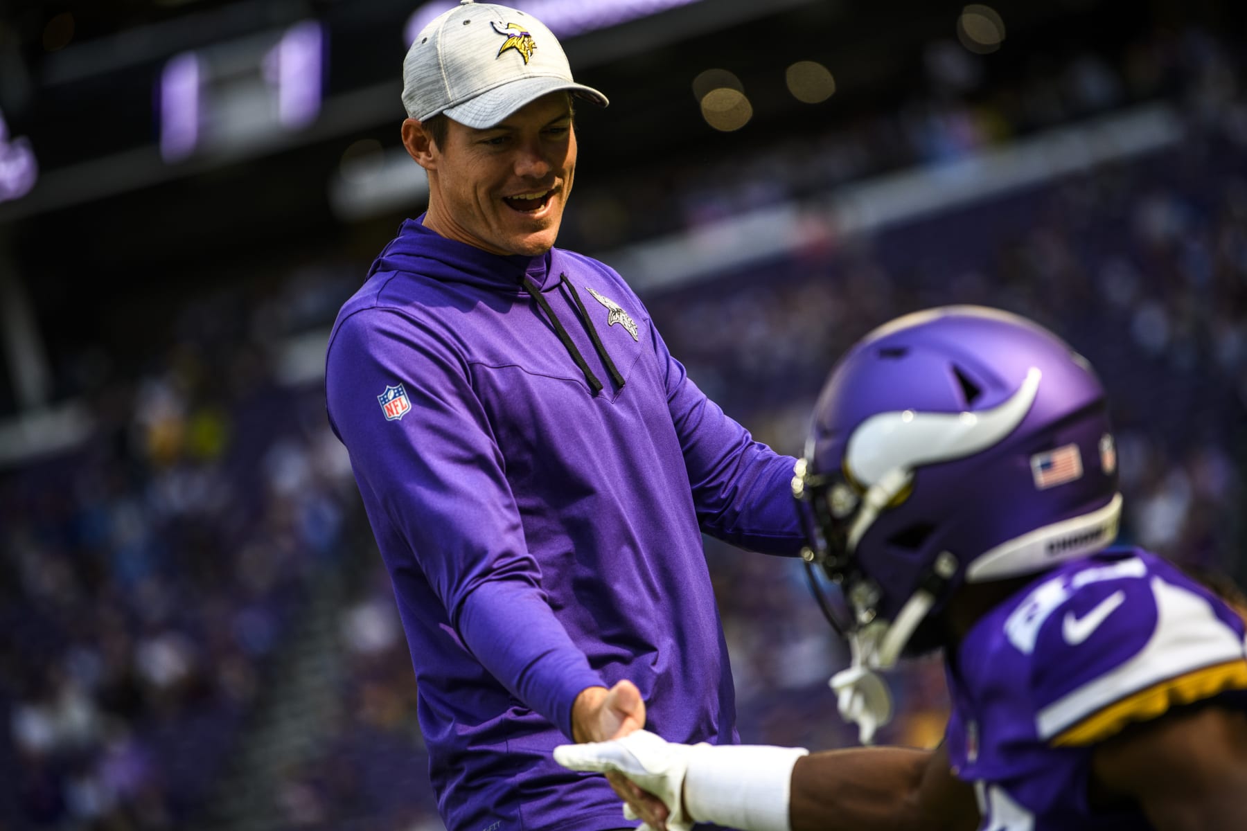 MINNEAPOLIS, MN - SEPTEMBER 25: Head coach Kevin O'Connell of the Minnesota Vikings greets players before the game against the Detroit Lions at U.S. Bank Stadium on September 25, 2022 in Minneapolis, Minnesota. (Photo by Stephen Maturen/Getty Images)