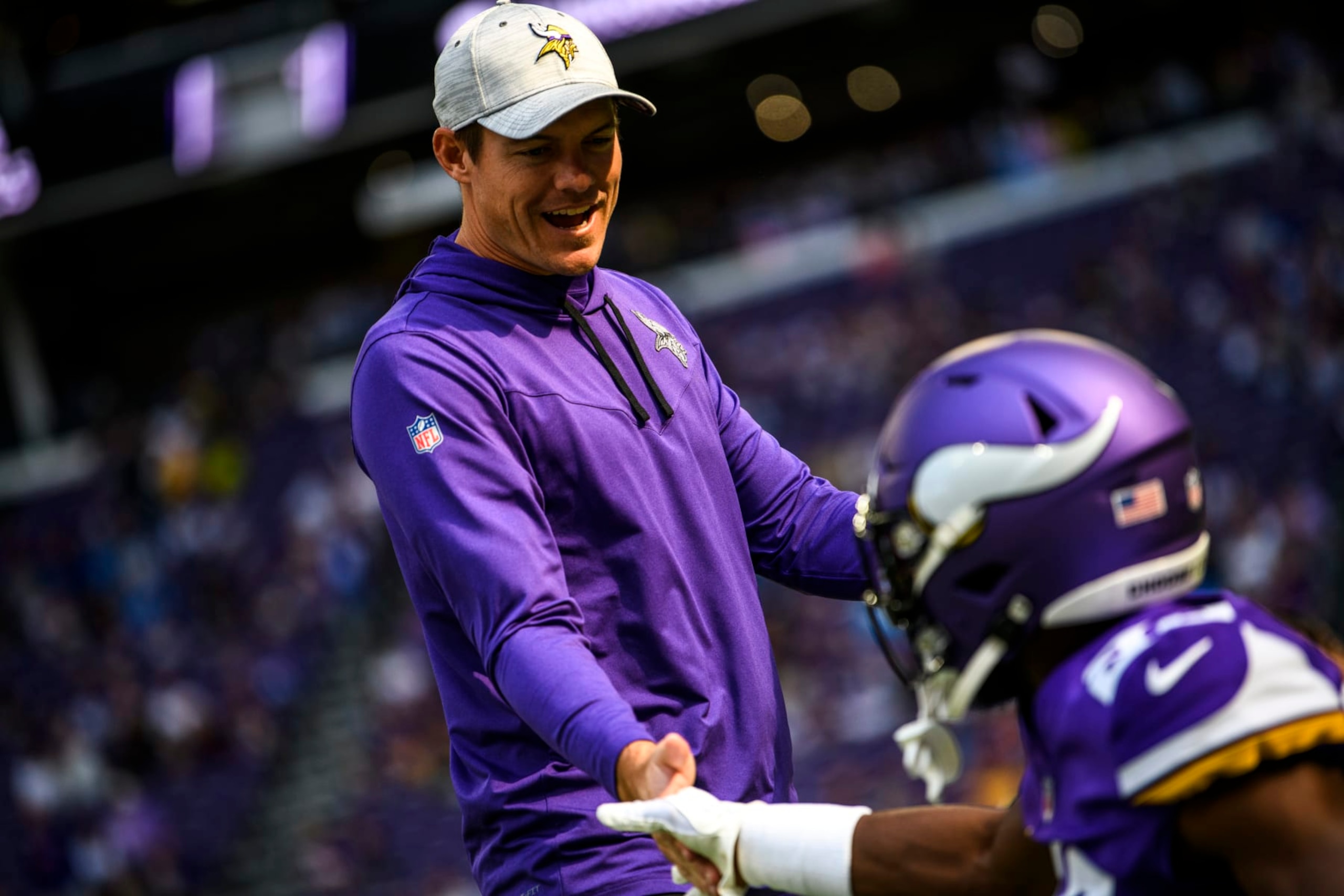 MINNEAPOLIS, MN - SEPTEMBER 25: Head coach Kevin O'Connell of the Minnesota Vikings greets players before the game against the Detroit Lions at U.S. Bank Stadium on September 25, 2022 in Minneapolis, Minnesota. (Photo by Stephen Maturen/Getty Images)