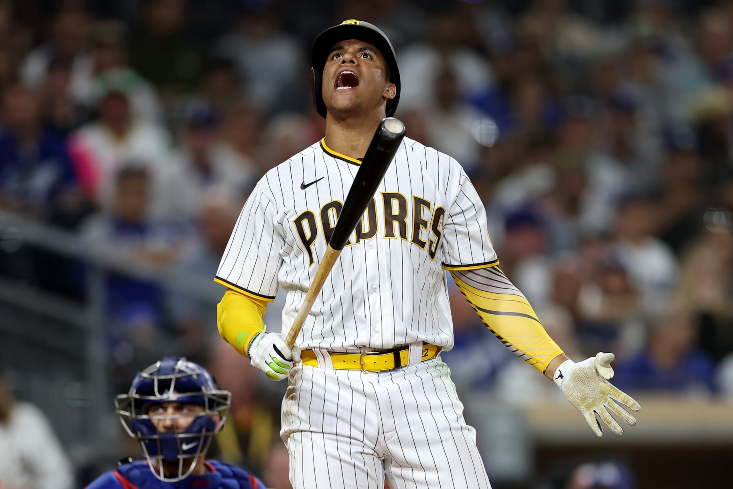 SAN DIEGO, CALIFORNIA - SEPTEMBER 29: Juan Soto #22 of the San Diego Padres reacts to a strike during the seventh inning of a game against the Los Angeles Dodgers at PETCO Park on September 29, 2022 in San Diego, California. (Photo by Sean M. Haffey/Getty Images)