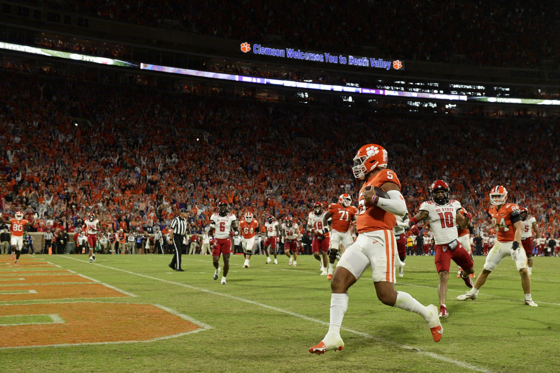 CLEMSON, SOUTH CAROLINA - OCTOBER 01: DJ Uiagalelei #5 of the Clemson Tigers scores a fourth quarter touchdown against the North Carolina State Wolfpack at Memorial Stadium on October 01, 2022 in Clemson, South Carolina. (Photo by Eakin Howard/Getty Images)