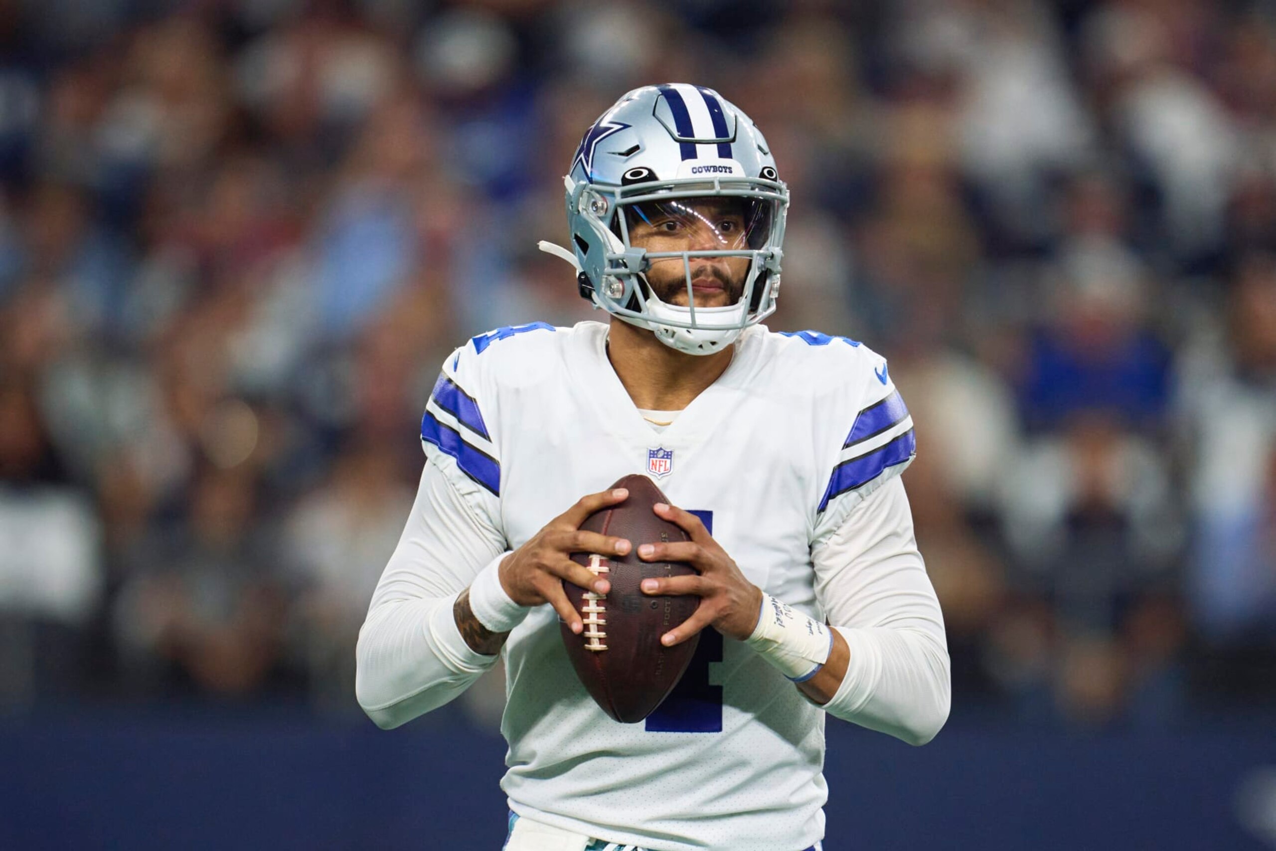 ARLINGTON, TX - SEPTEMBER 11: Dak Prescott #4 of the Dallas Cowboys drops back to pass against the Tampa Bay Buccaneers at AT&T Stadium on September 11, 2022 in Arlington, TX. (Photo by Cooper Neill/Getty Images)