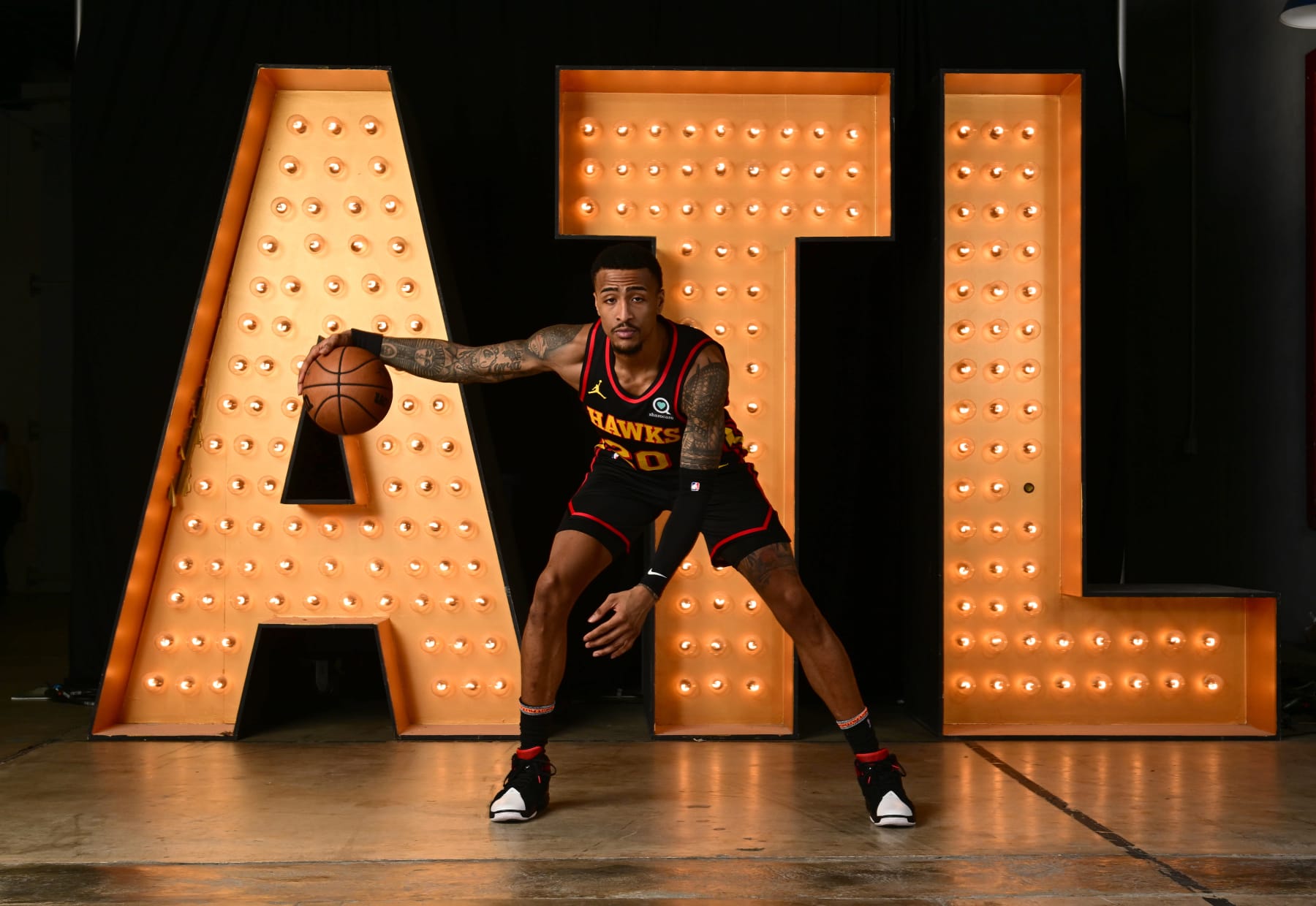 ATLANTA, GA - SEPTEMBER 23: John Collins #20 of the Atlanta Hawks poses for a portrait during NBA Media Day on September 23, 2022 at PC&E Studio in Atlanta, Georgia. NOTE TO USER: User expressly acknowledges and agrees that, by downloading and or using this Photograph, user is consenting to the terms and conditions of the Getty Images License Agreement. Mandatory Copyright Notice: Copyright 2022 NBAE (Photo by Adam Hagy/NBAE via Getty Images)