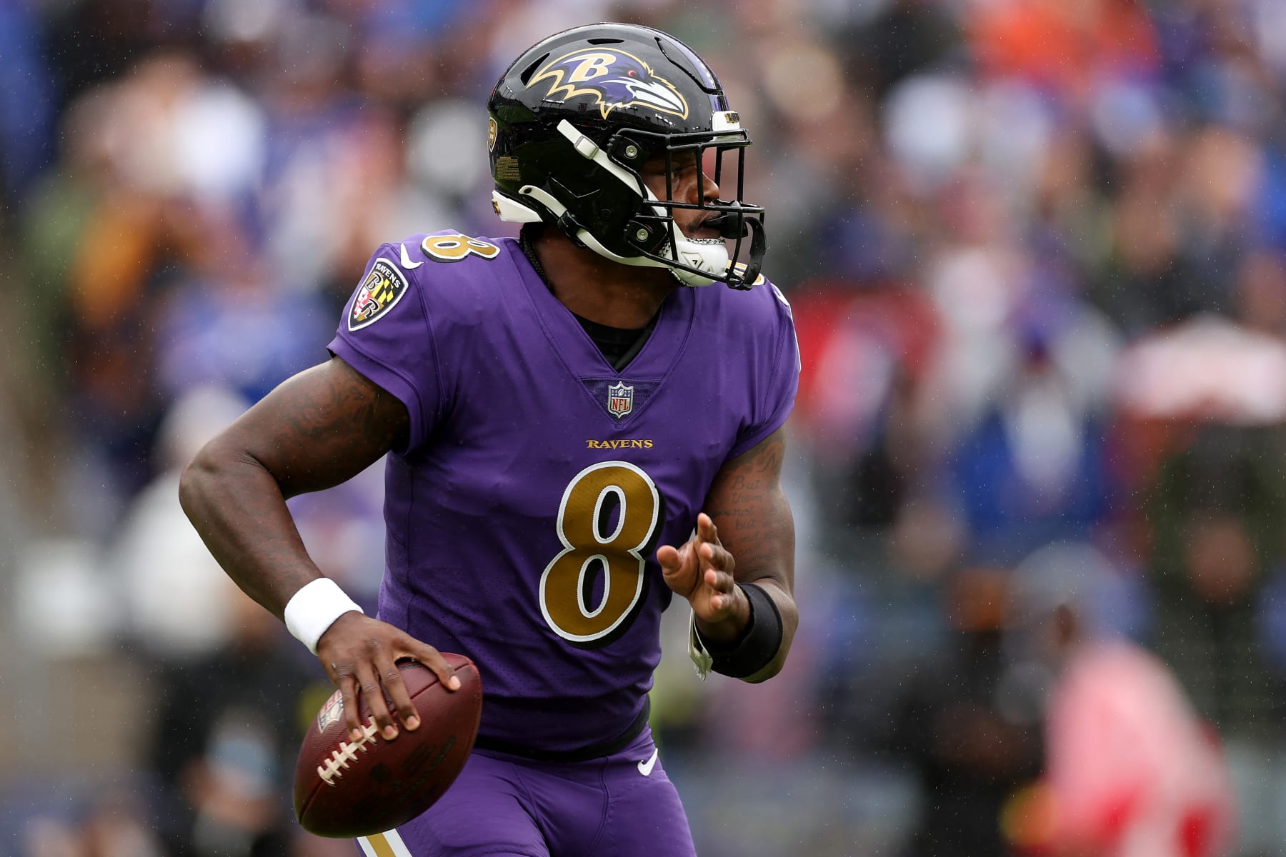 BALTIMORE, MARYLAND - OCTOBER 02: Lamar Jackson #8 of the Baltimore Ravens drops back to pass in the first quarter against the Buffalo Bills at M&T Bank Stadium on October 02, 2022 in Baltimore, Maryland. (Photo by Patrick Smith/Getty Images)