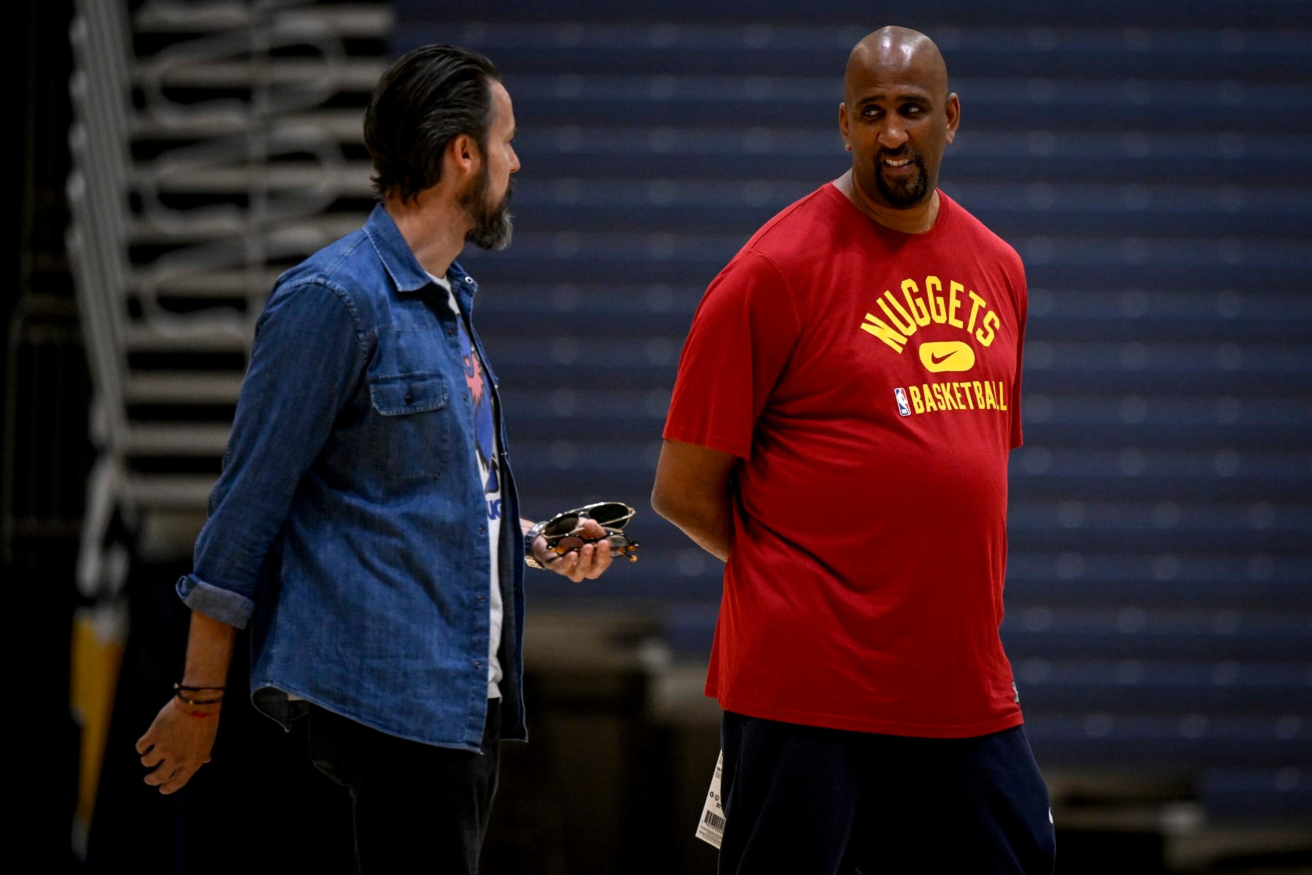 LA JOLLA, CA - SEPTEMBER 30: Denver Nuggets governor Josh Kroenke speaks with general manager Calvin Booth during the teams training camp at the UCSD campus in La Jolla, California on Friday, September 30, 2022. (Photo by AAron Ontiveroz/MediaNews Group/The Denver Post via Getty Images)