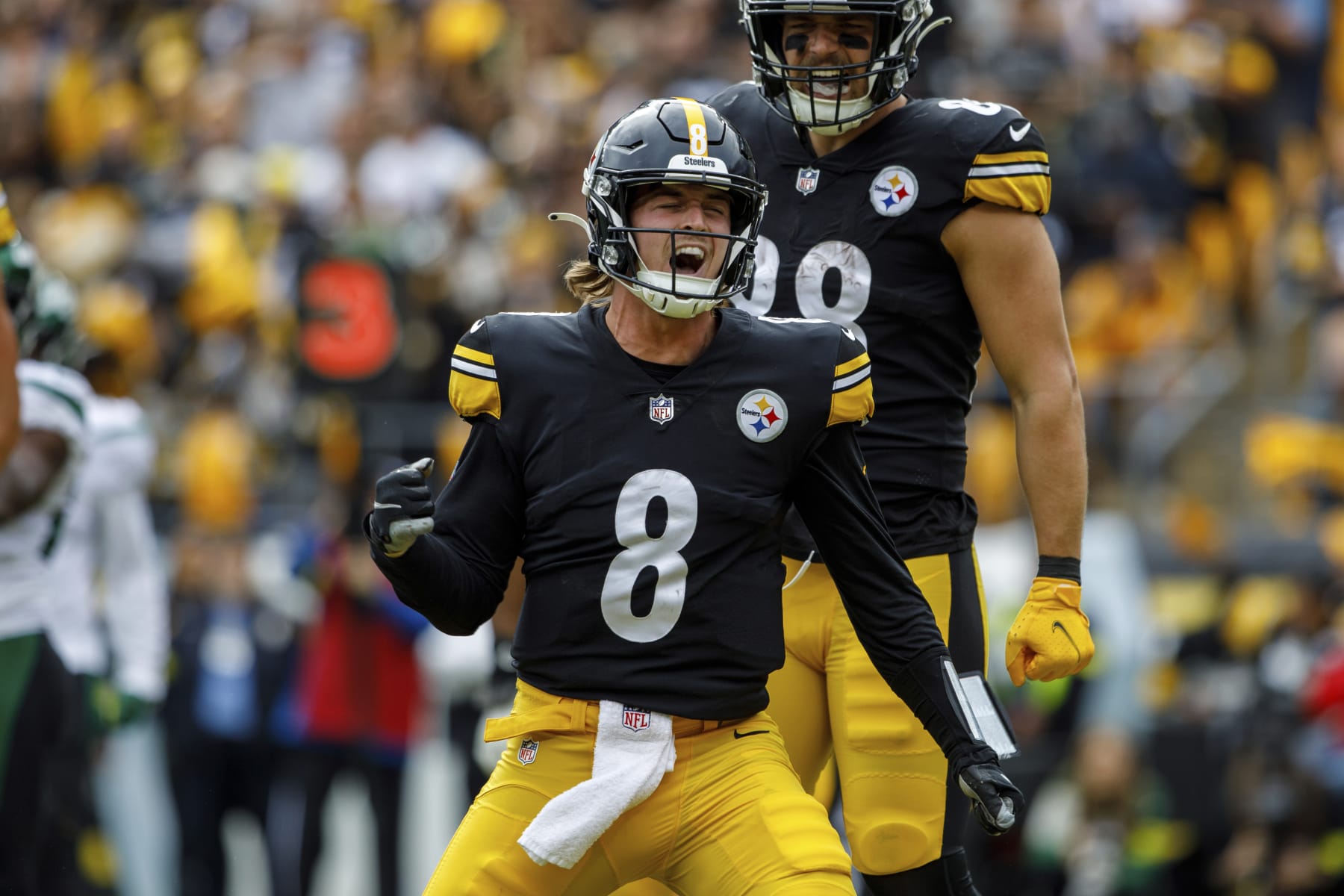 Pittsburgh Steelers quarterback Kenny Pickett (8) celebrates after scoring his first career touchdown against the New York Jets during an NFL football game, Sunday, Oct. 2, 2022, in Pittsburgh, PA. (AP Photo/Matt Durisko)