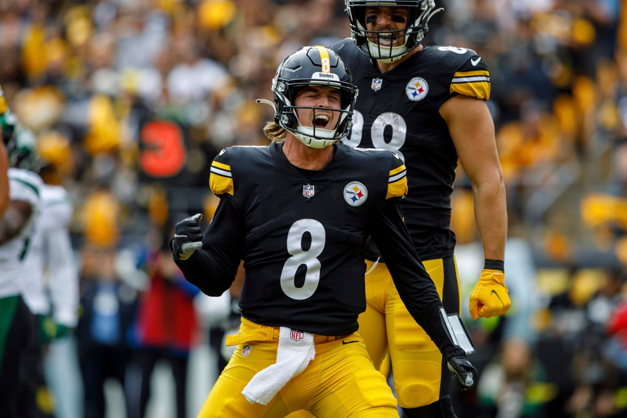Pittsburgh Steelers quarterback Kenny Pickett (8) celebrates after scoring his first career touchdown against the New York Jets during an NFL football game, Sunday, Oct. 2, 2022, in Pittsburgh, PA. (AP Photo/Matt Durisko)