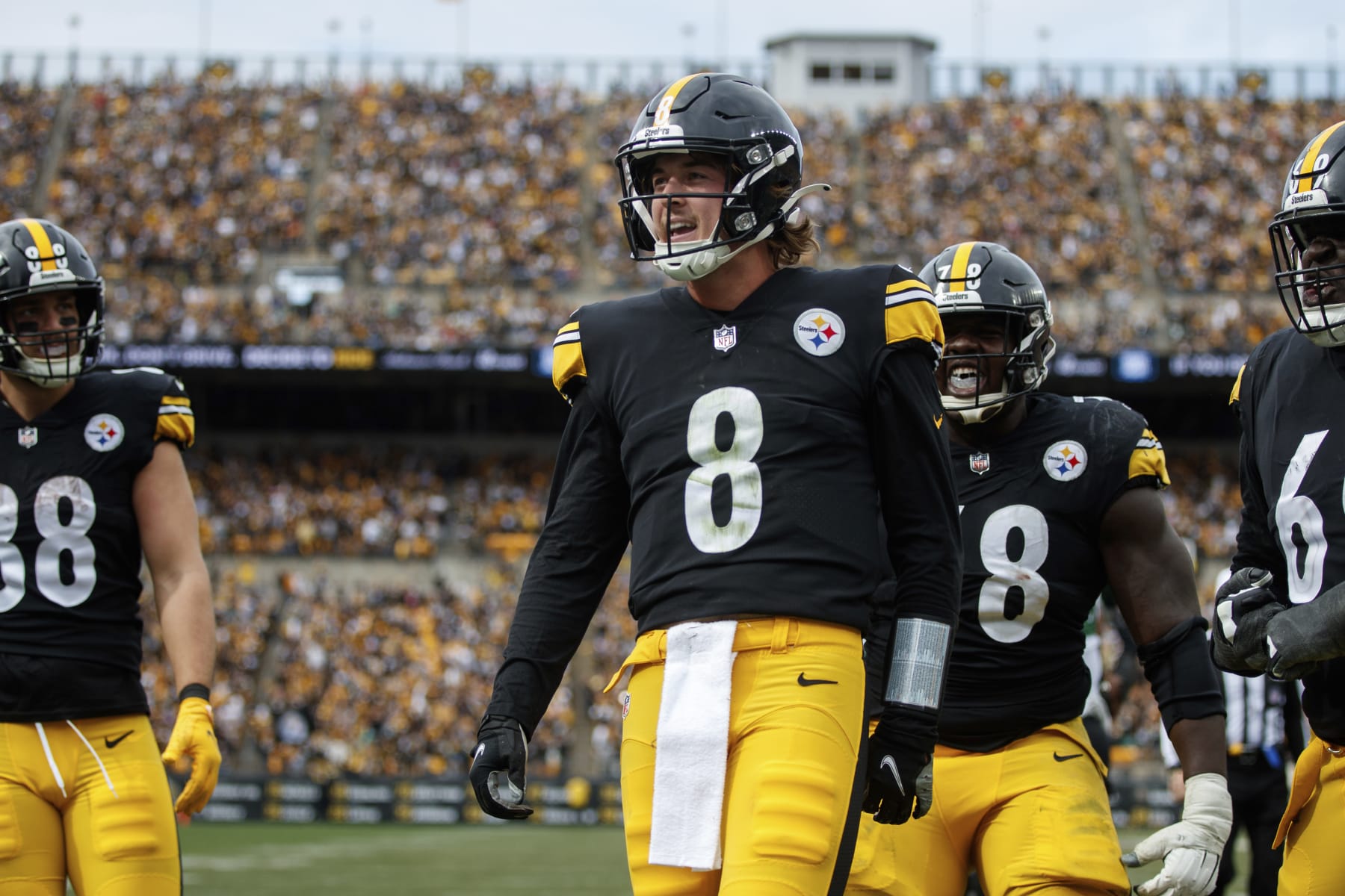 Pittsburgh Steelers quarterback Kenny Pickett (8) celebrates after his second touchdown of the day against the New York Jets during an NFL football game, Sunday, Oct. 2, 2022, in Pittsburgh, PA. (AP Photo/Matt Durisko)