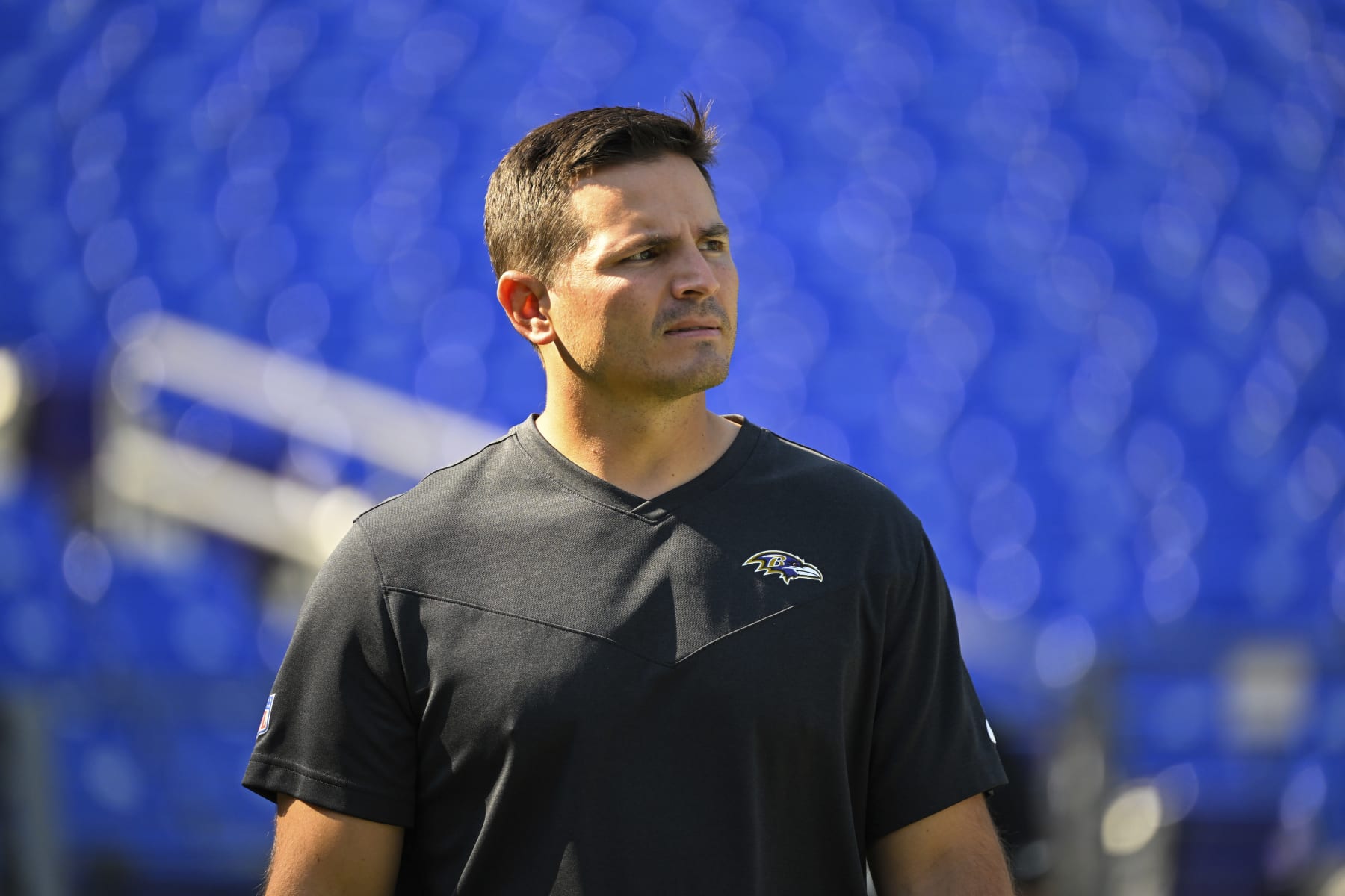 Baltimore Ravens defensive coordinator Mike Macdonald looks on during pre-game warm-ups before a football game against the Miami Dolphins, Sunday, Sept. 18, 2022, in Baltimore. (AP Photo/Terrance Williams)
