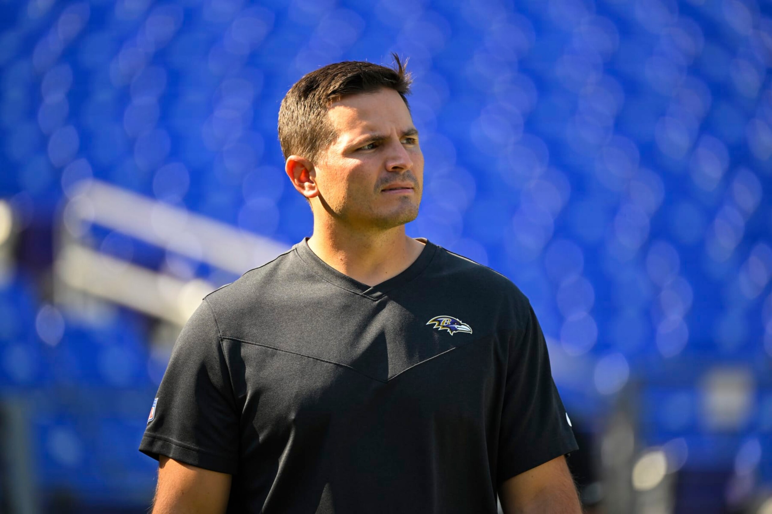 Baltimore Ravens defensive coordinator Mike Macdonald looks on during pre-game warm-ups before a football game against the Miami Dolphins, Sunday, Sept. 18, 2022, in Baltimore. (AP Photo/Terrance Williams)