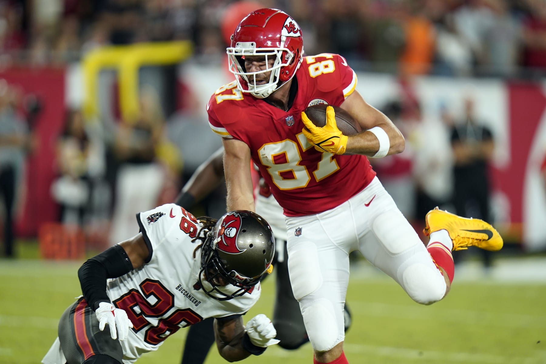 Kansas City Chiefs tight end Travis Kelce (87) makes a touchdown reception during the first half of an NFL football game against the Tampa Bay Buccaneers Sunday, Oct. 2, 2022, in Tampa, Fla. (AP Photo/Chris O'Meara)