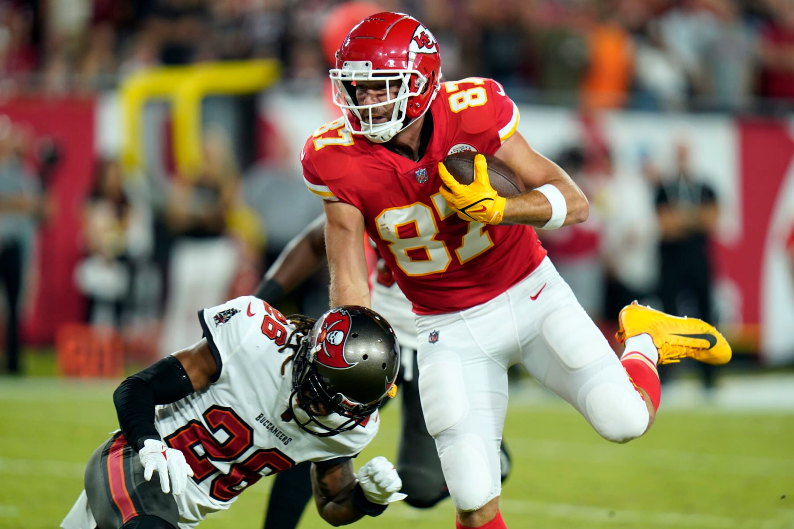 Kansas City Chiefs tight end Travis Kelce (87) makes a touchdown reception during the first half of an NFL football game against the Tampa Bay Buccaneers Sunday, Oct. 2, 2022, in Tampa, Fla. (AP Photo/Chris O'Meara)