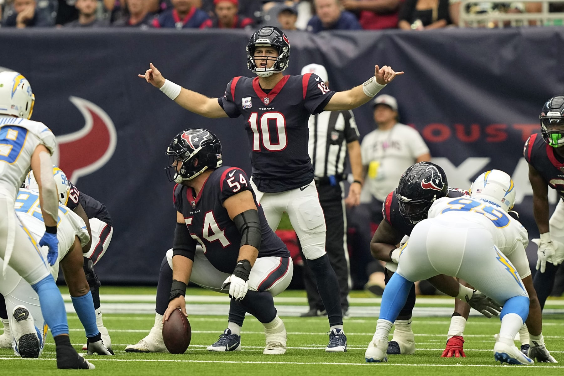 Houston Texans quarterback Davis Mills (10) calls a play against the Los Angeles Chargers during the second half of an NFL football game Sunday, Oct. 2, 2022, in Houston. (AP Photo/David J. Phillip)