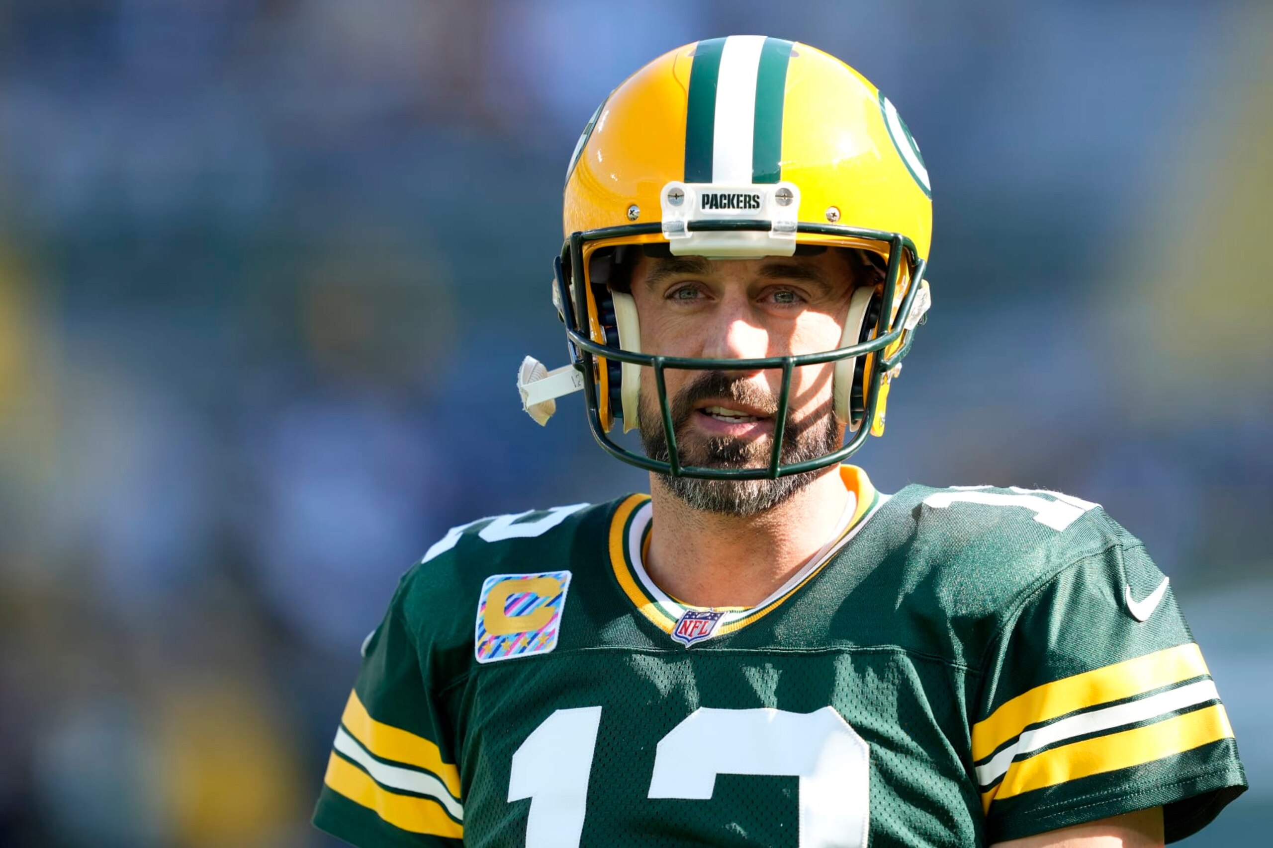 GREEN BAY, WISCONSIN - OCTOBER 02: Aaron Rodgers #12 of the Green Bay Packers looks onward before his game against the New England Patriots at Lambeau Field on October 02, 2022 in Green Bay, Wisconsin. (Photo by Patrick McDermott/Getty Images)