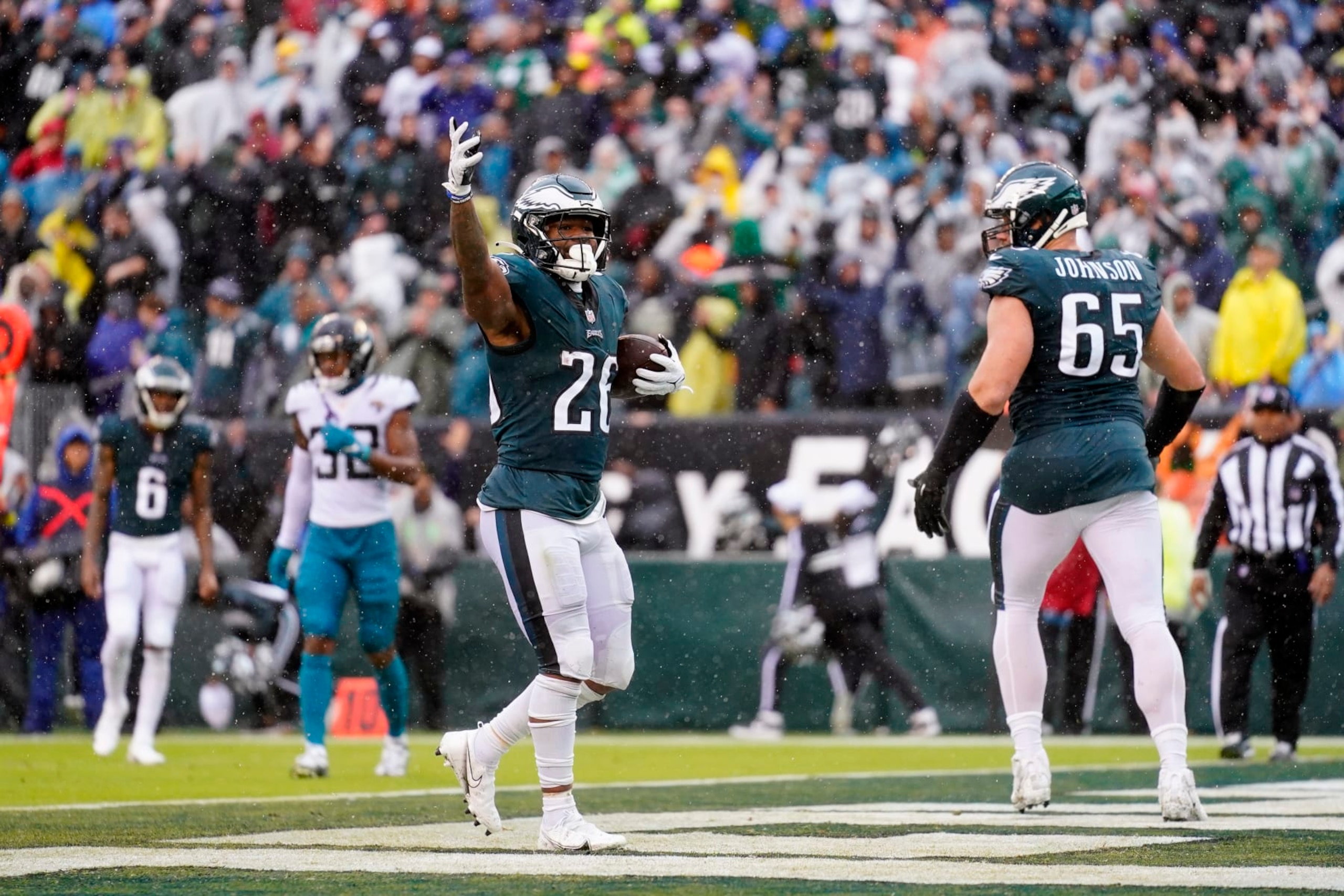 Philadelphia Eagles' Miles Sanders celebrates a touchdown during the second half of an NFL football game against the Jacksonville Jaguars on Sunday, Oct. 2, 2022, in Philadelphia. (AP Photo/Matt Rourke)