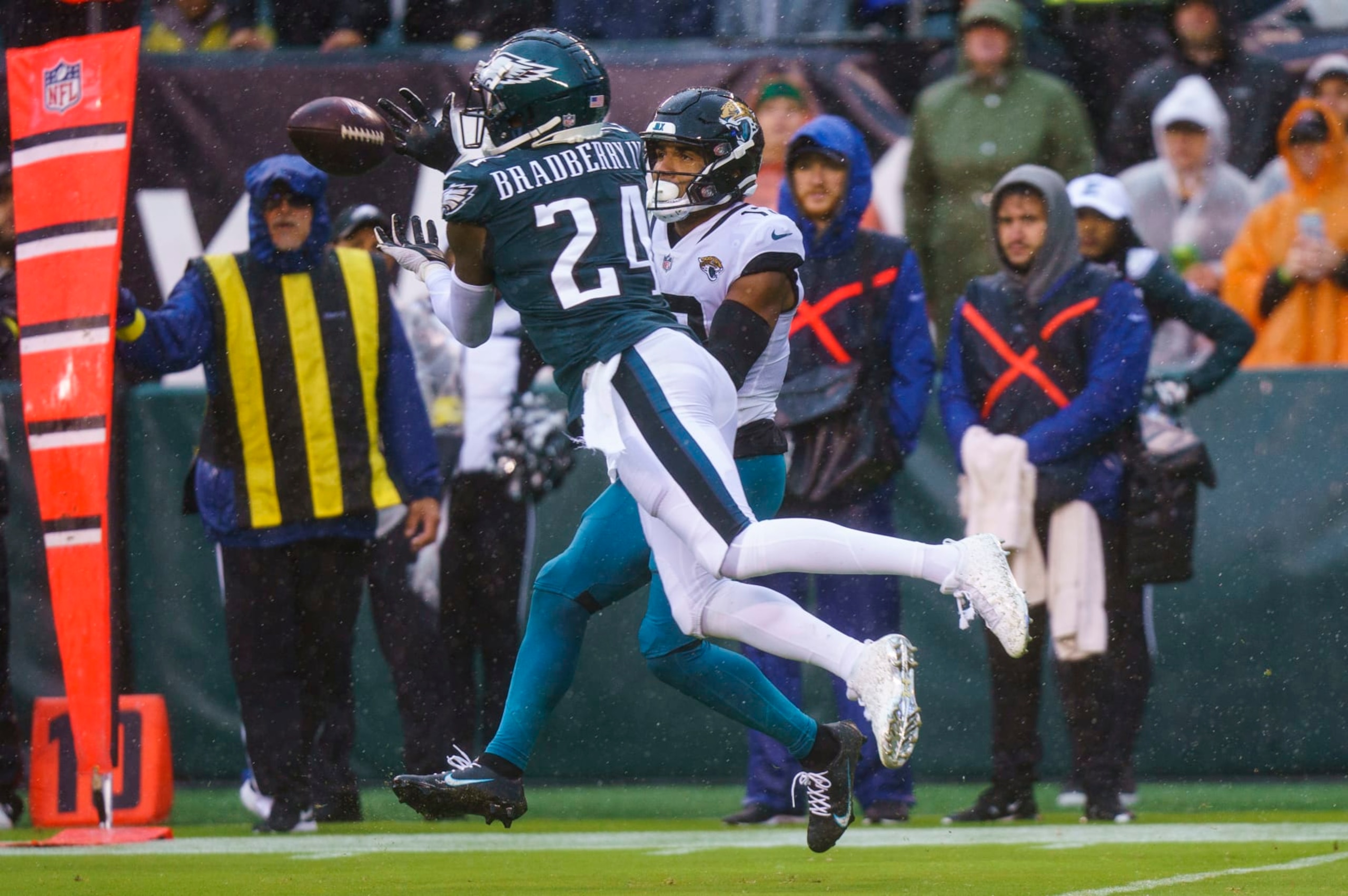 Philadelphia Eagles cornerback James Bradberry (24) intercepts the ball for Jacksonville Jaguars wide receiver Christian Kirk (13) during the NFL football game, Sunday, Oct. 2, 2022, in Philadelphia. (AP Photo/Chris Szagola)