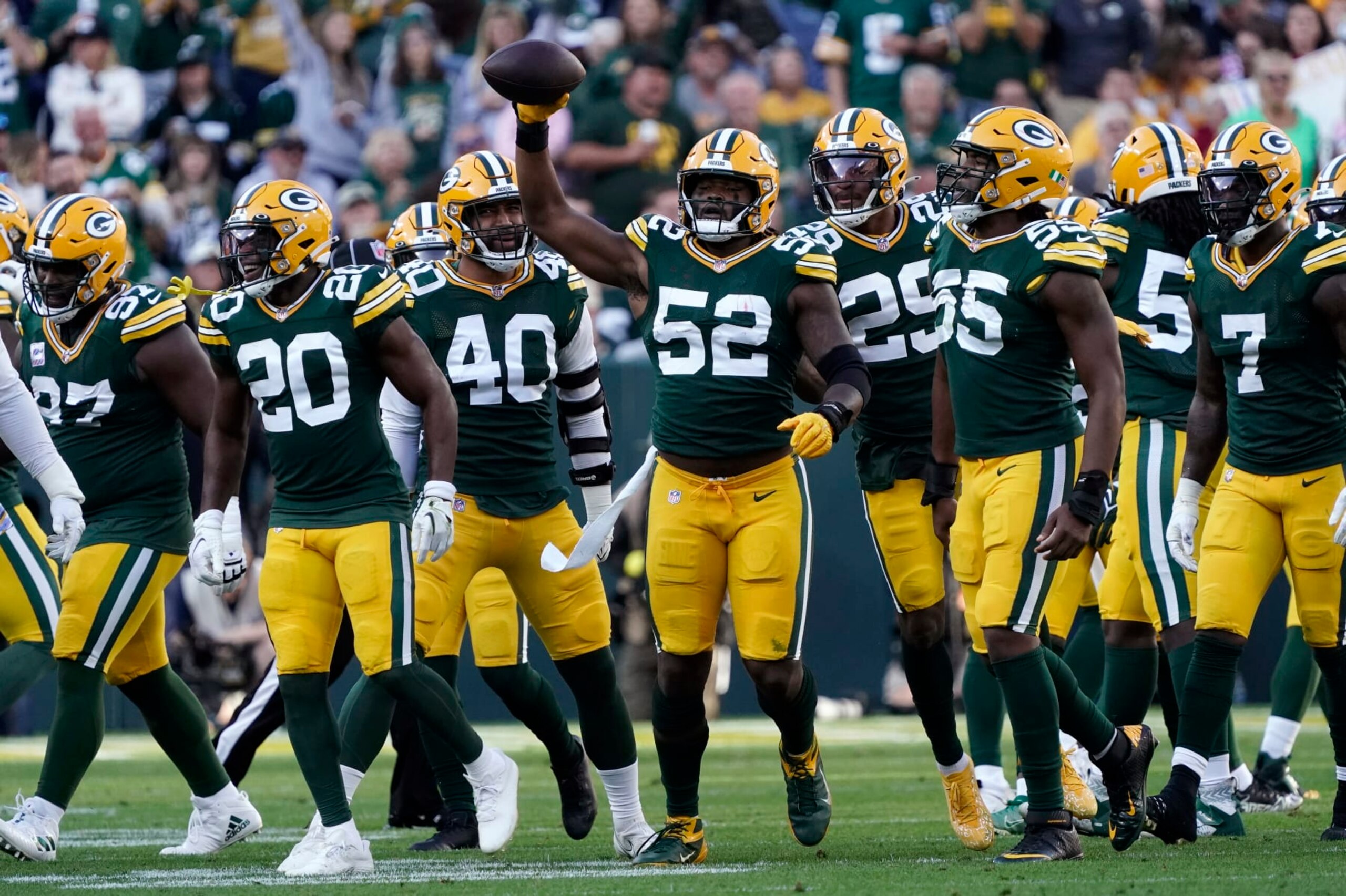 Green Bay Packers linebacker Rashan Gary (52) celebrates after recovering a fumble by New England Patriots quarterback Bailey Zappe during the first half of an NFL football game, Sunday, Oct. 2, 2022, in Green Bay, Wis. (AP Photo/Morry Gash)