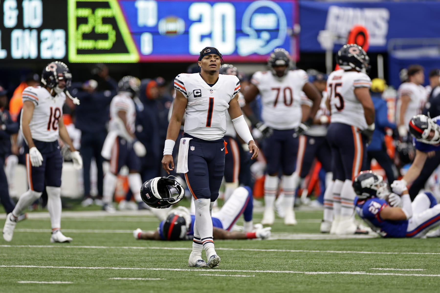 Chicago Bears quarterback Justin Fields (1) reacts at the end of the game against the New York Giants during an NFL football game Sunday, Oct. 2, 2022, in East Rutherford, N.J. (AP Photo/Adam Hunger)
