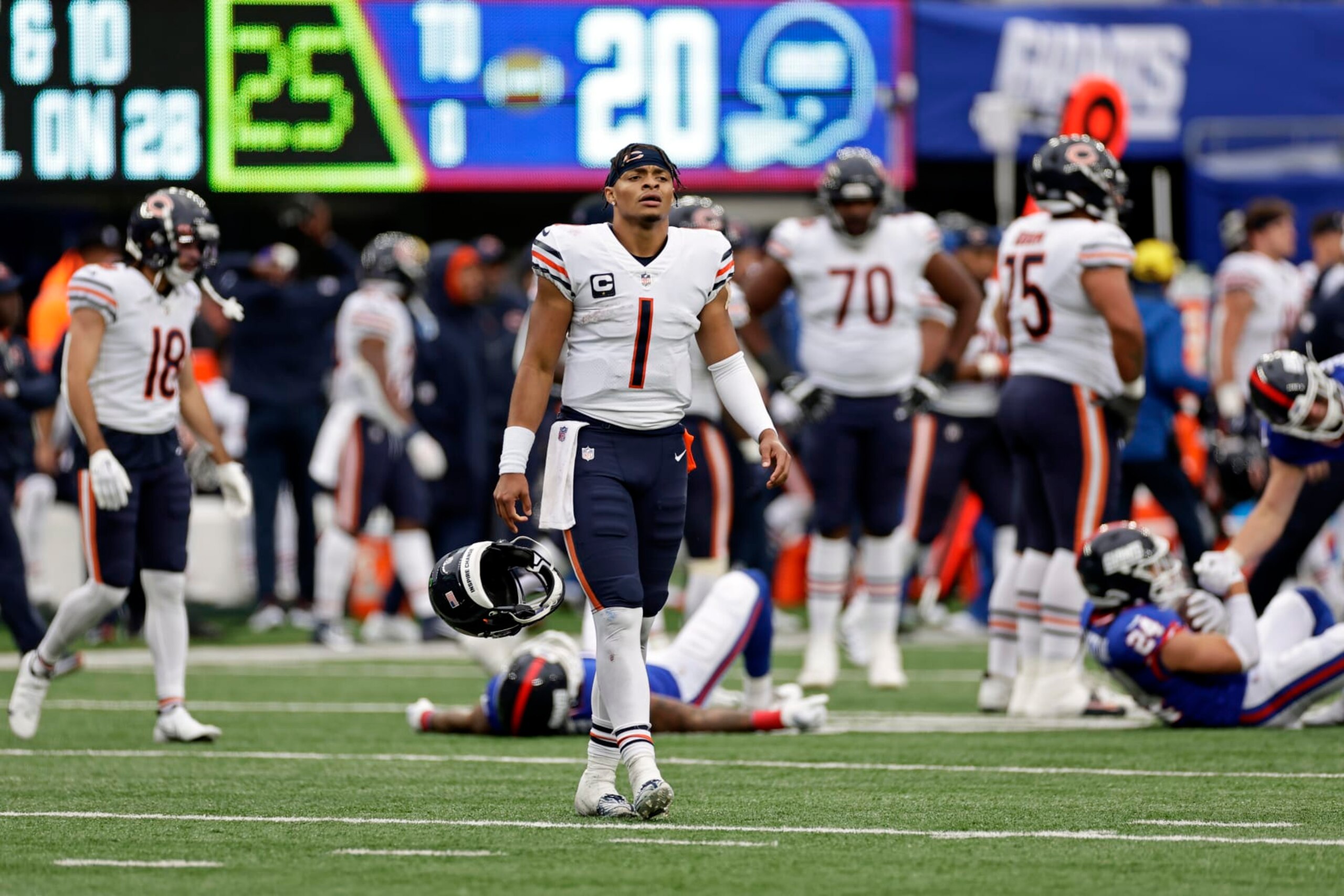 Chicago Bears quarterback Justin Fields (1) reacts at the end of the game against the New York Giants during an NFL football game Sunday, Oct. 2, 2022, in East Rutherford, N.J. (AP Photo/Adam Hunger)