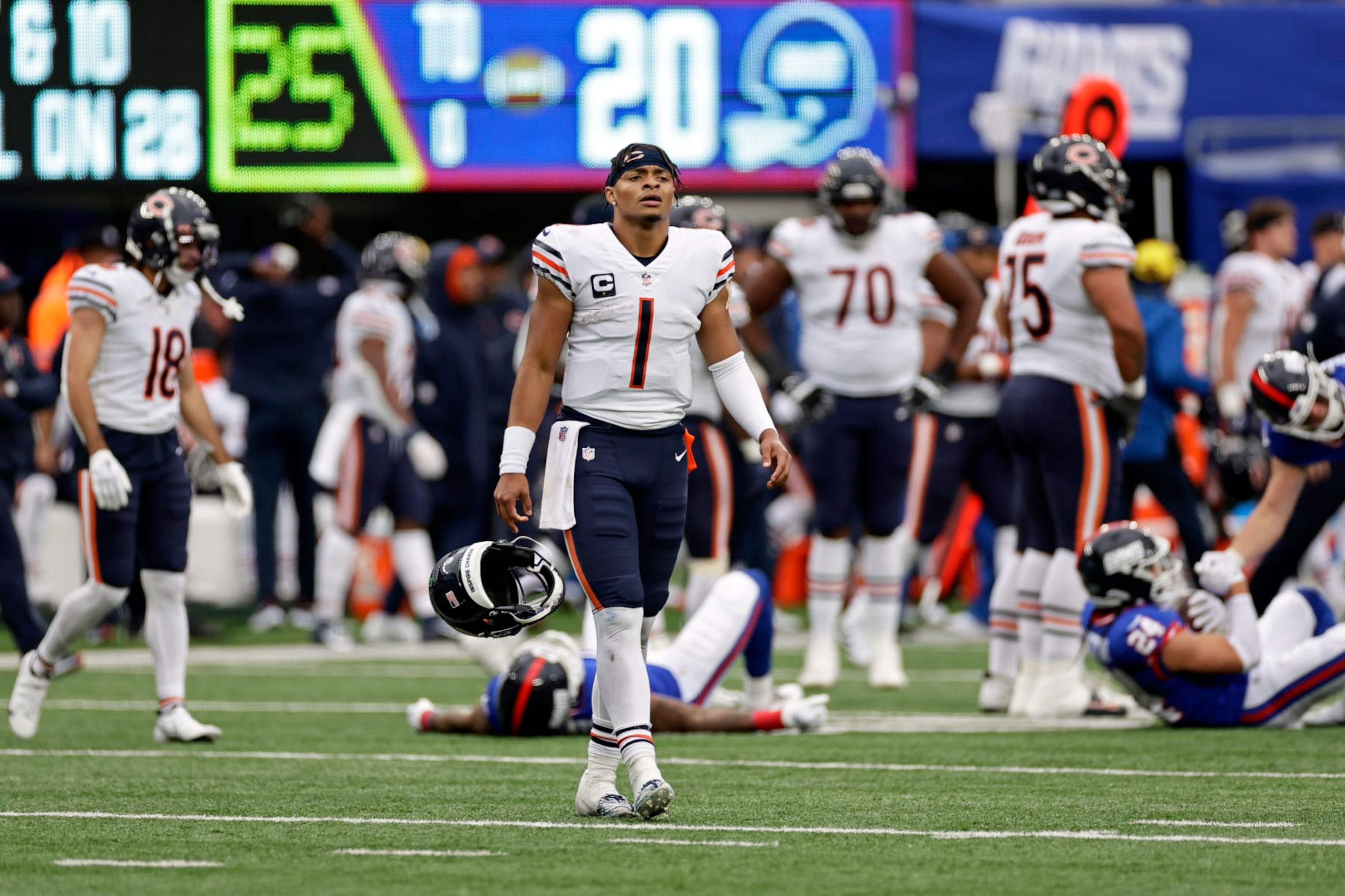 Chicago Bears quarterback Justin Fields (1) reacts at the end of the game against the New York Giants during an NFL football game Sunday, Oct. 2, 2022, in East Rutherford, N.J. (AP Photo/Adam Hunger)