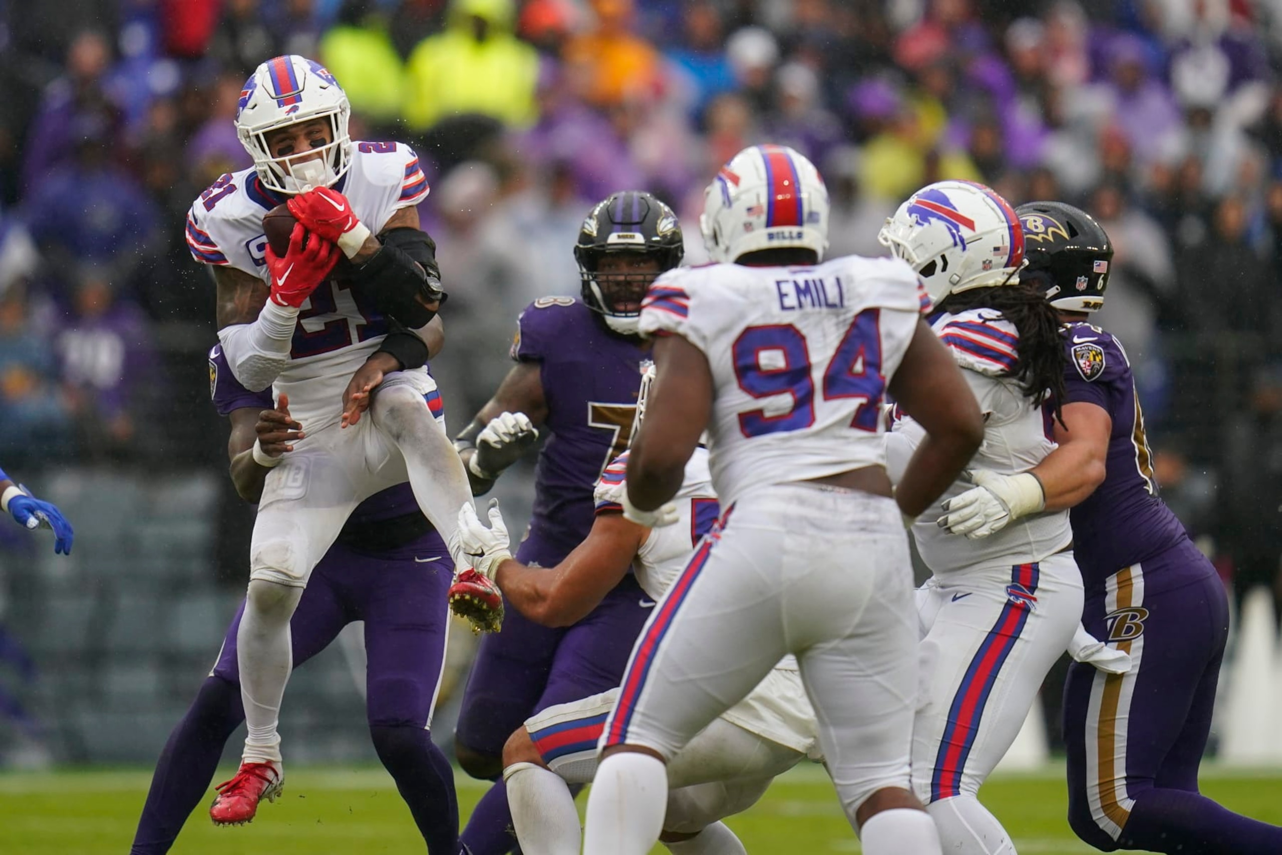 Buffalo Bills safety Jordan Poyer (21) intercepts a pass against the Baltimore Ravens in the second half of an NFL football game Sunday, Oct. 2, 2022, in Baltimore. (AP Photo/Julio Cortez)