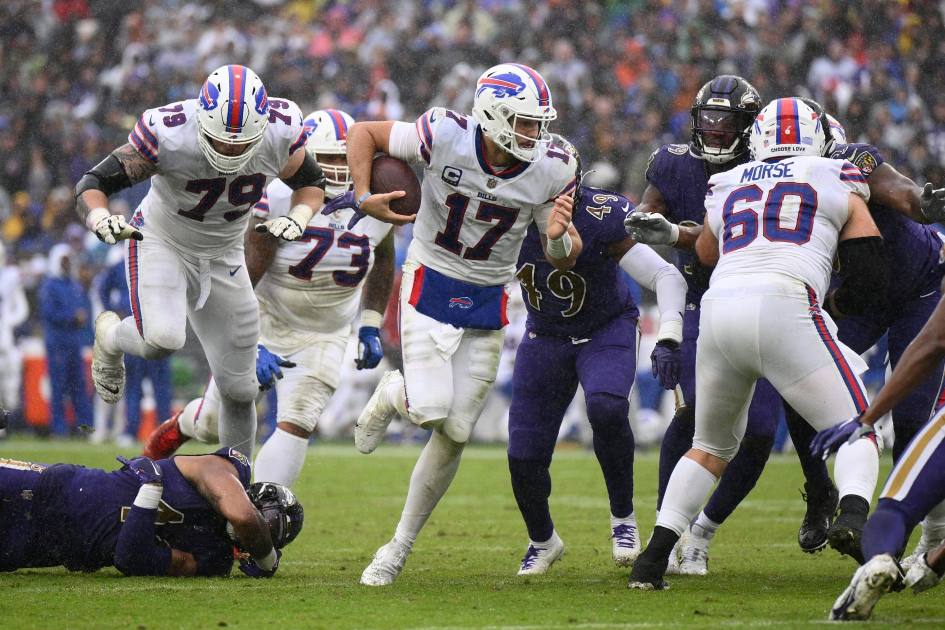 Buffalo Bills quarterback Josh Allen (17) runs for a touchdown against the Baltimore Ravens in the second half of an NFL football game Sunday, Oct. 2, 2022, in Baltimore. (AP Photo/Nick Wass) Buffalo Bills quarterback Josh Allen (17) runs for a touchdown against the Baltimore Ravens in the second half of an NFL football game Sunday, Oct. 2, 2022, in Baltimore. (AP Photo/Nick Wass)