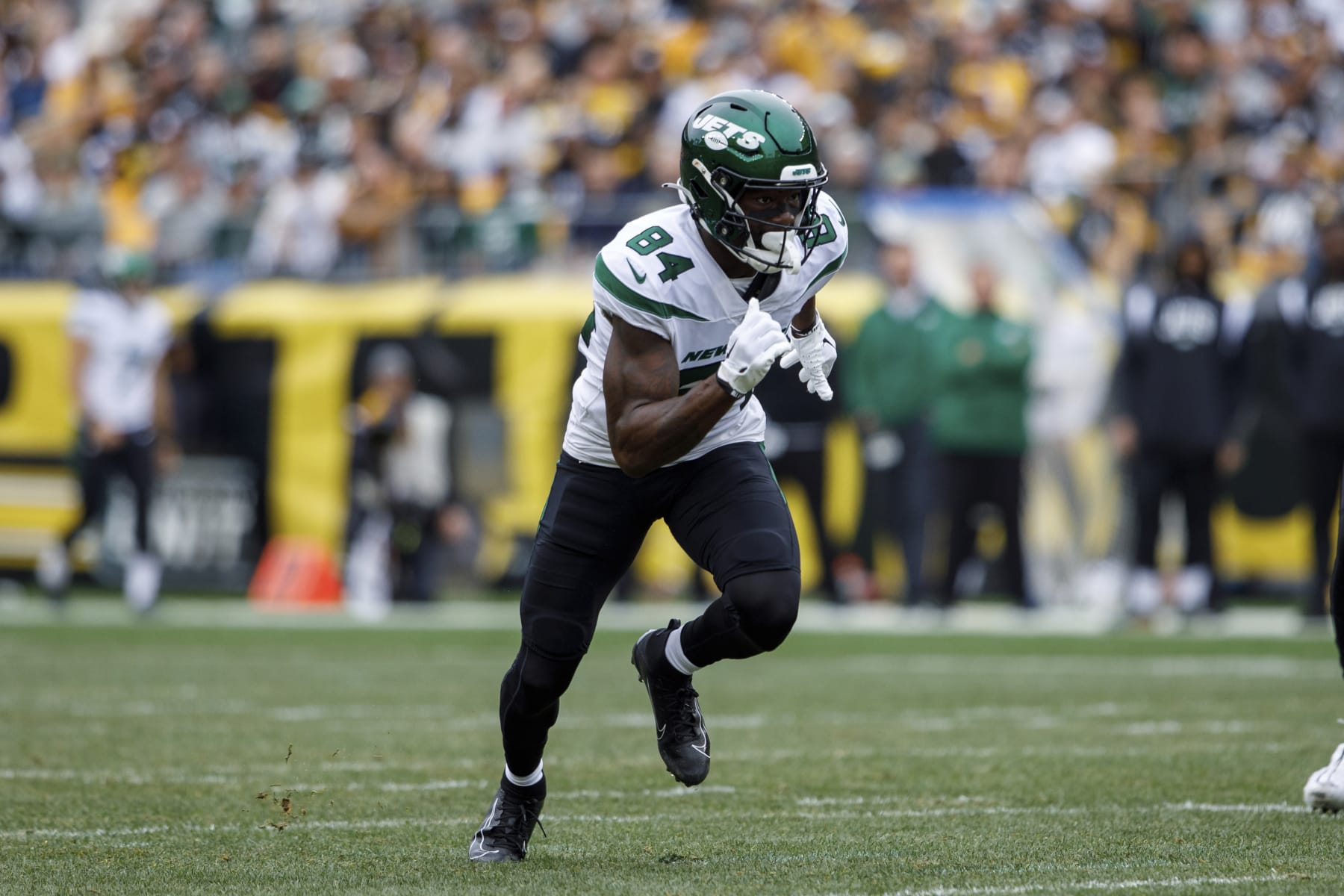 New York Jets wide receiver Corey Davis (84) runs a route during an NFL football game, Sunday, Oct. 2, 2022, in Pittsburgh, PA. (AP Photo/Matt Durisko)