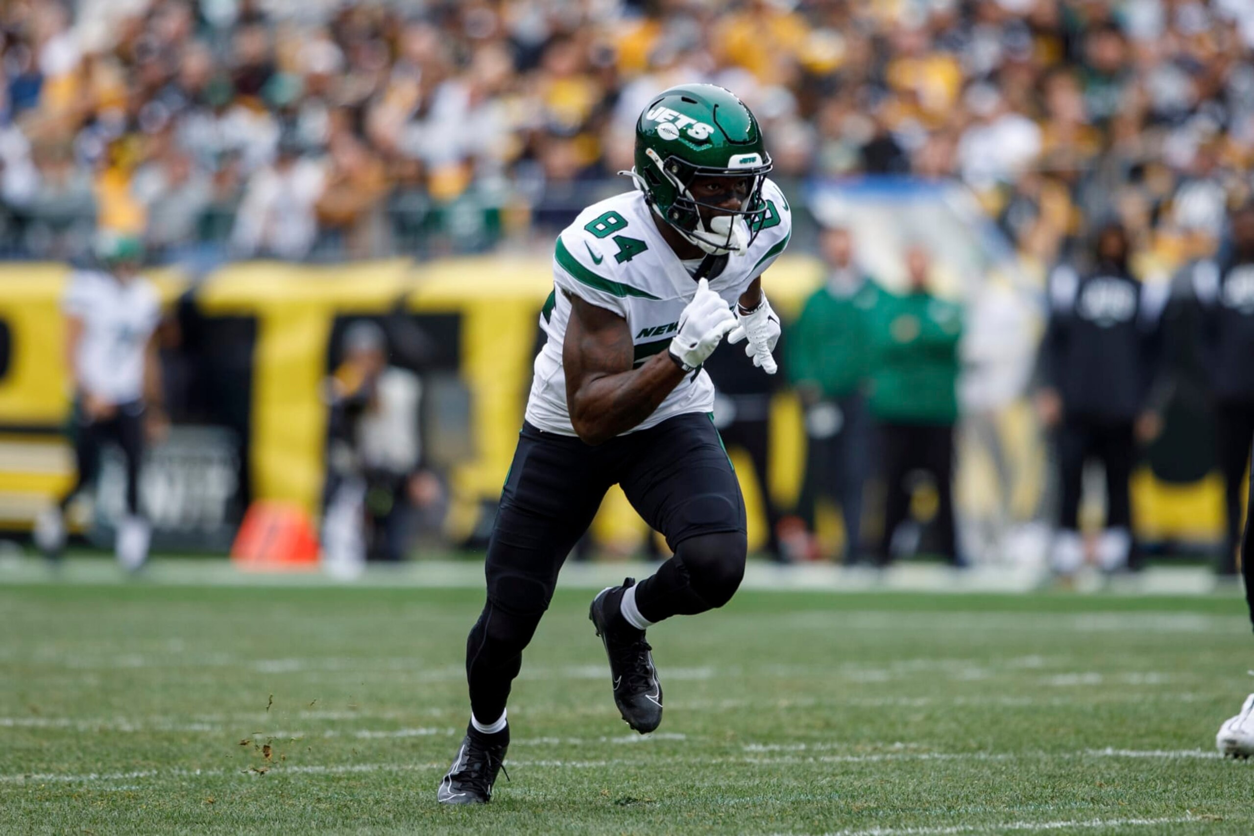 New York Jets wide receiver Corey Davis (84) runs a route during an NFL football game, Sunday, Oct. 2, 2022, in Pittsburgh, PA. (AP Photo/Matt Durisko)