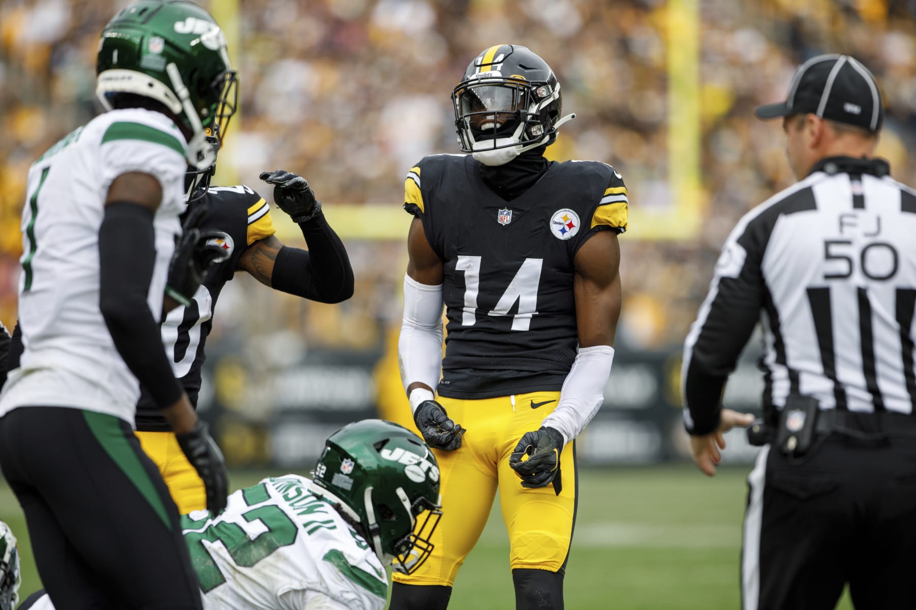 Pittsburgh Steelers wide receiver George Pickens (14) celebrates after a play during an NFL football game, Sunday, Oct. 2, 2022, in Pittsburgh, PA. (AP Photo/Matt Durisko)