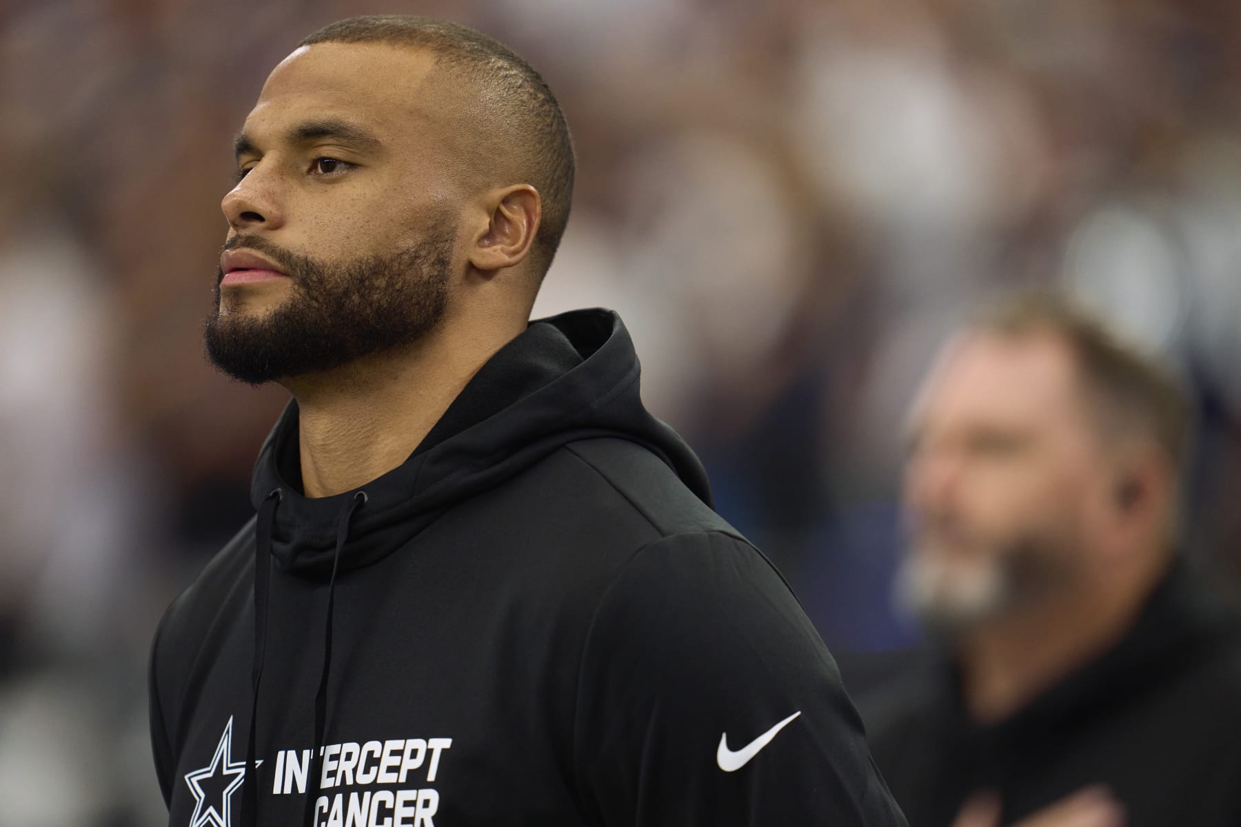ARLINGTON, TX - OCTOBER 02: Dak Prescott #4 of the Dallas Cowboys looks on before kickoff against the Washington Commanders at AT&T Stadium on October 2, 2022 in Arlington, Texas. (Photo by Cooper Neill/Getty Images)