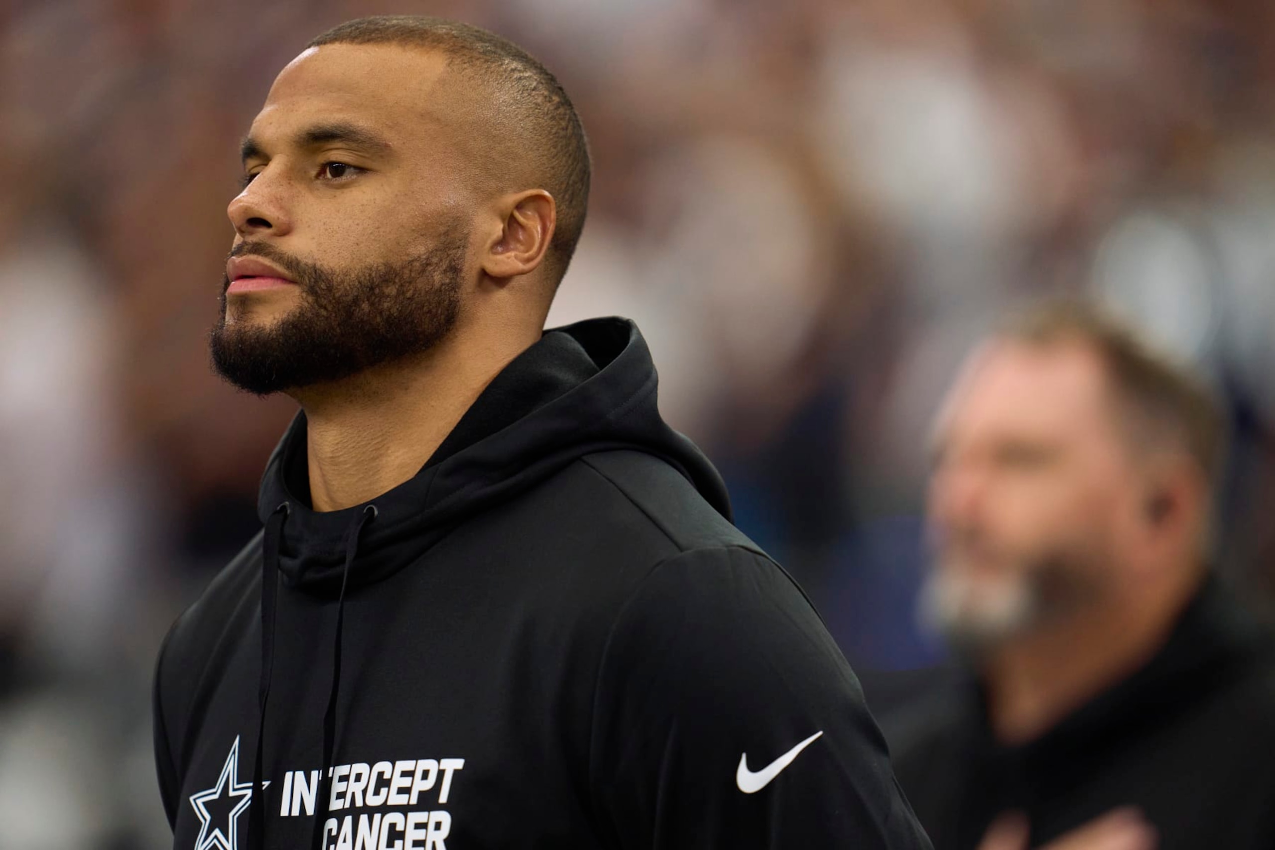 ARLINGTON, TX - OCTOBER 02: Dak Prescott #4 of the Dallas Cowboys looks on before kickoff against the Washington Commanders at AT&T Stadium on October 2, 2022 in Arlington, Texas. (Photo by Cooper Neill/Getty Images)