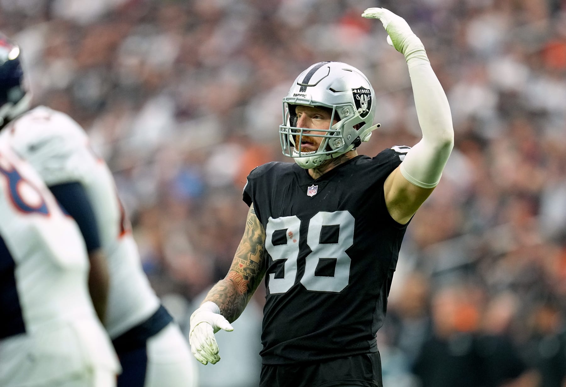 LAS VEGAS, NEVADA - OCTOBER 02: Maxx Crosby #98 of the Las Vegas Raiders reacts in the fourth quarter against the Denver Broncos at Allegiant Stadium on October 02, 2022 in Las Vegas, Nevada. (Photo by Jeff Bottari/Getty Images)