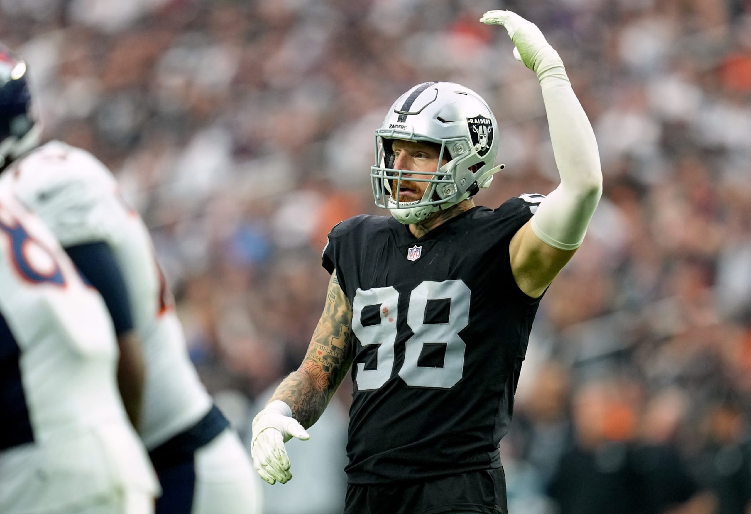 LAS VEGAS, NEVADA - OCTOBER 02: Maxx Crosby #98 of the Las Vegas Raiders reacts in the fourth quarter against the Denver Broncos at Allegiant Stadium on October 02, 2022 in Las Vegas, Nevada. (Photo by Jeff Bottari/Getty Images)