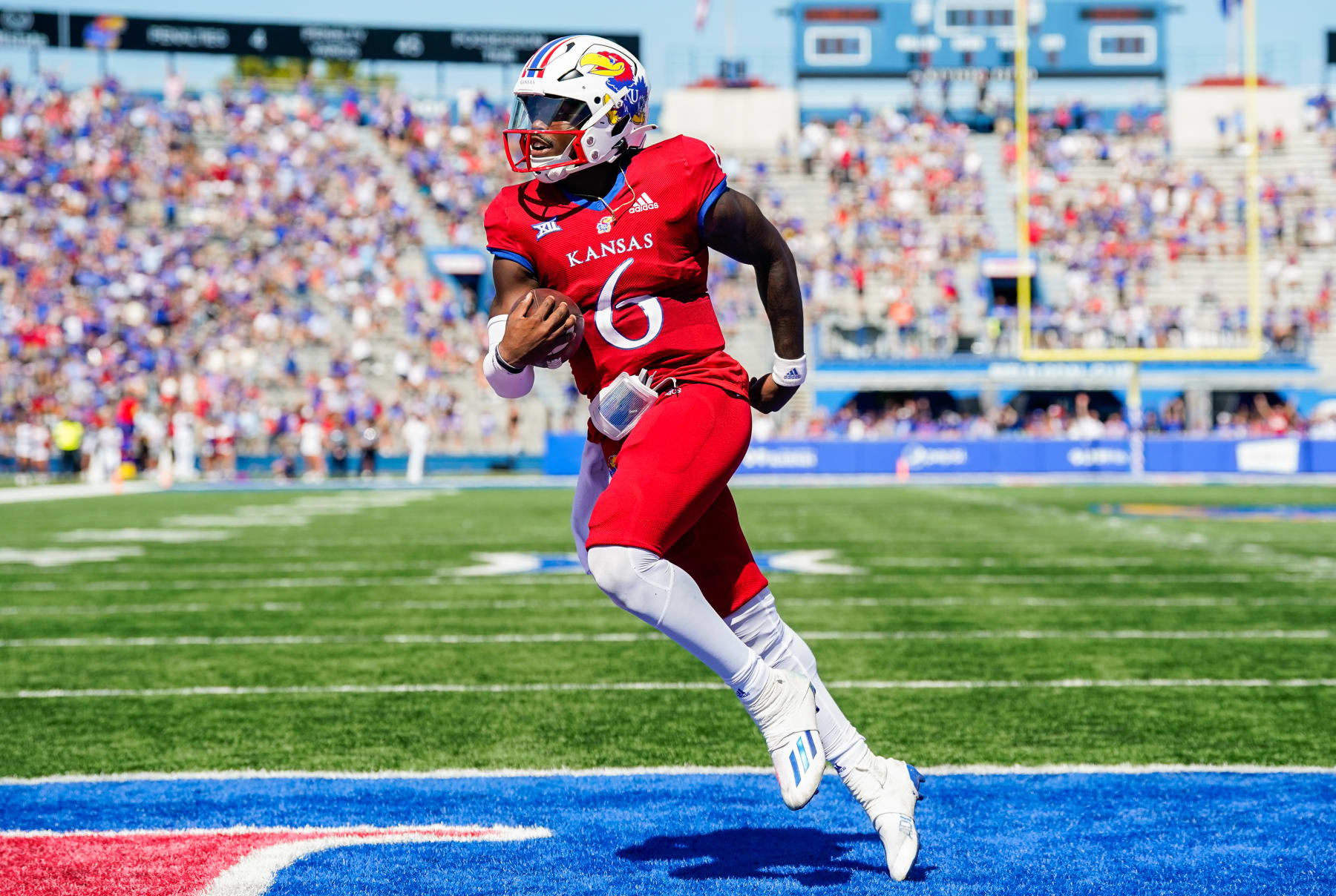 LAWRENCE, KS - SEPTEMBER 24: Jalon Daniels #6 of the Kansas Jayhawks runs for a touchdown during the second half against the Duke Blue Devils at David Booth Kansas Memorial Stadium on September 24, 2022 in Lawrence, Kansas. (Photo by Jay Biggerstaff/Getty Images)