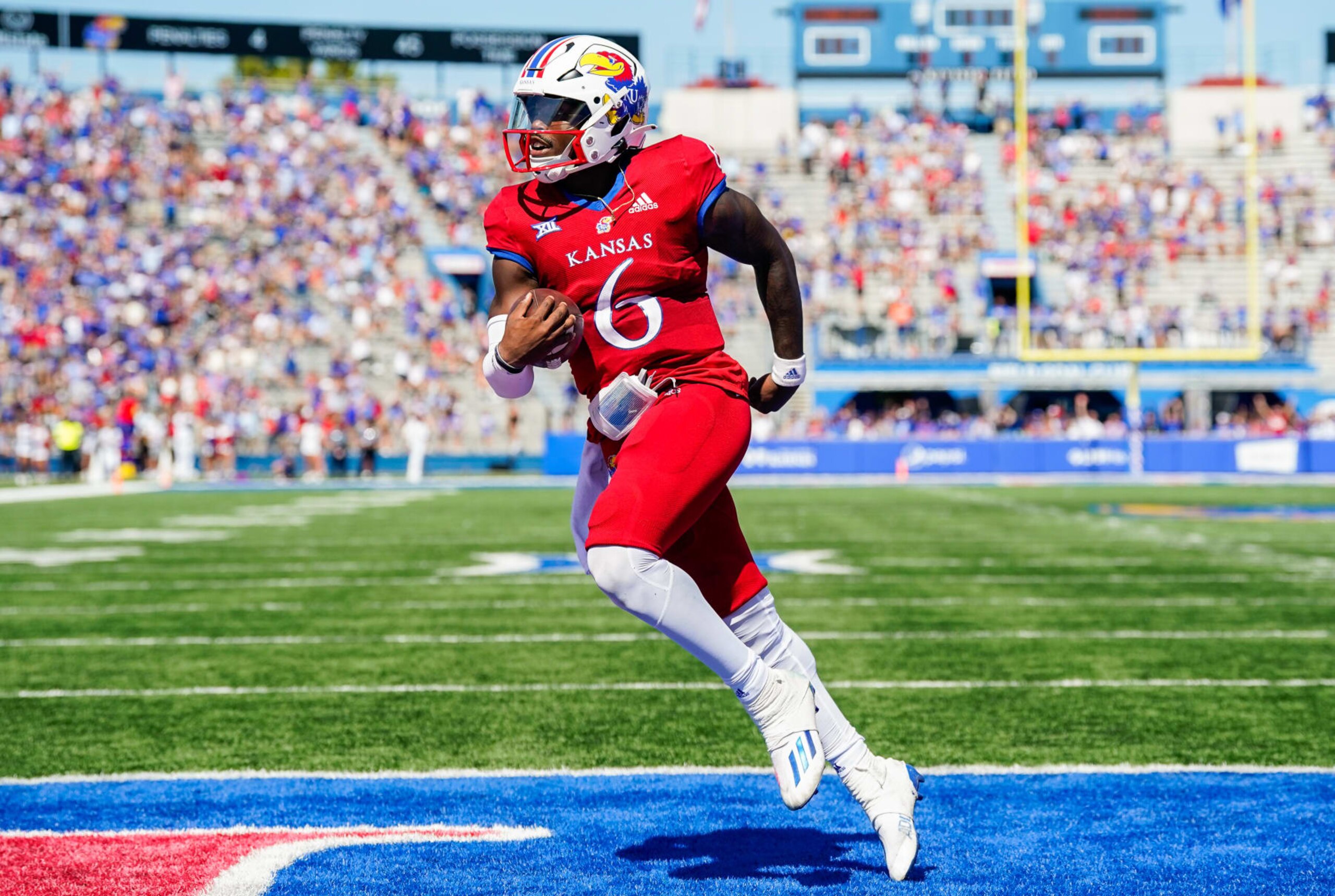 LAWRENCE, KS - SEPTEMBER 24: Jalon Daniels #6 of the Kansas Jayhawks runs for a touchdown during the second half against the Duke Blue Devils at David Booth Kansas Memorial Stadium on September 24, 2022 in Lawrence, Kansas. (Photo by Jay Biggerstaff/Getty Images)