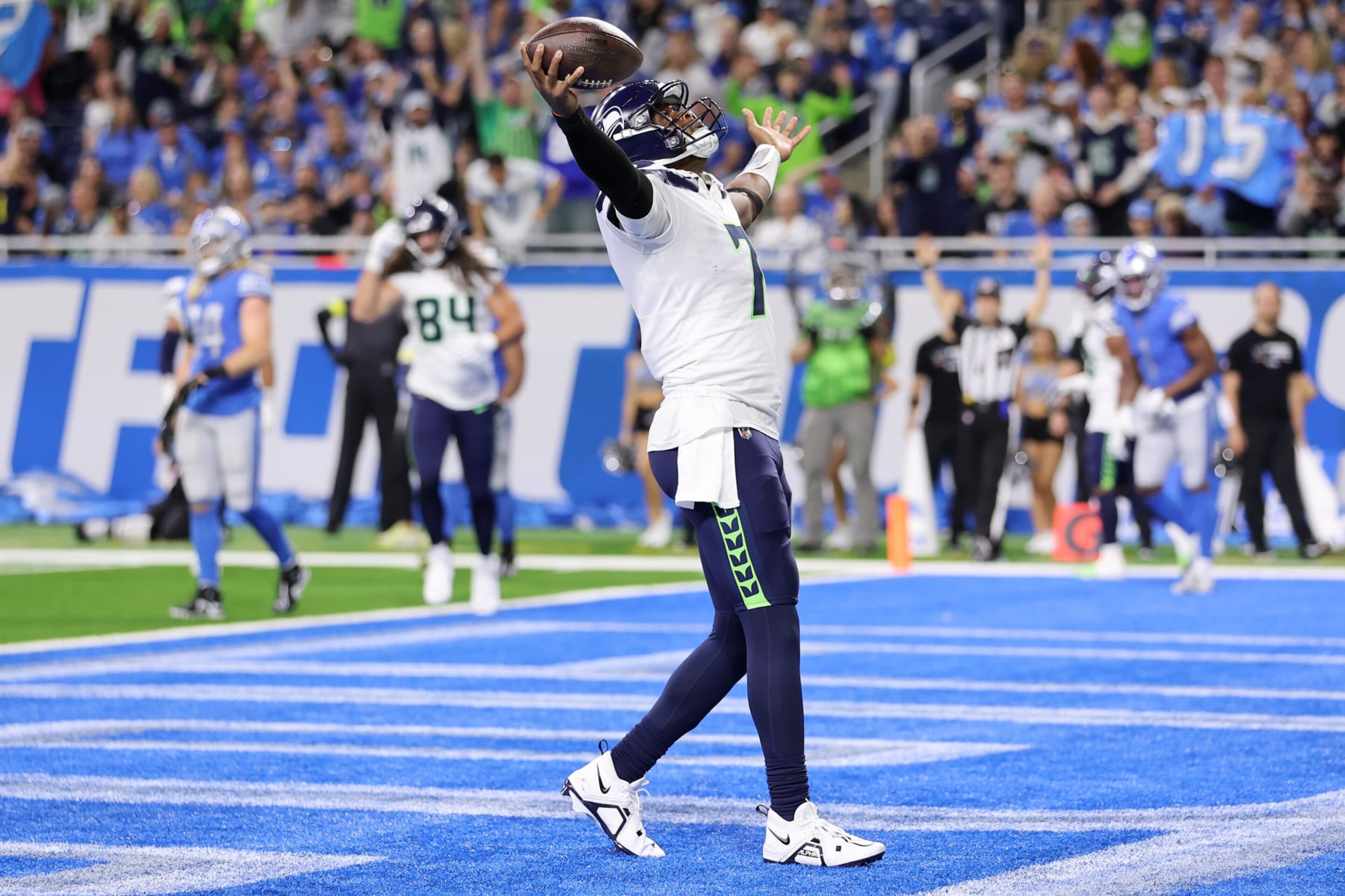 DETROIT, MICHIGAN - OCTOBER 02: Geno Smith #7 of the Seattle Seahawks celebrates after scoring a touchdown during the first quarter of the game against the Detroit Lions at Ford Field on October 02, 2022 in Detroit, Michigan. (Photo by Gregory Shamus/Getty Images) DETROIT, MICHIGAN - OCTOBER 02: Geno Smith #7 of the Seattle Seahawks celebrates after scoring a touchdown during the first quarter of the game against the Detroit Lions at Ford Field on October 02, 2022 in Detroit, Michigan. (Photo by Gregory Shamus/Getty Images)