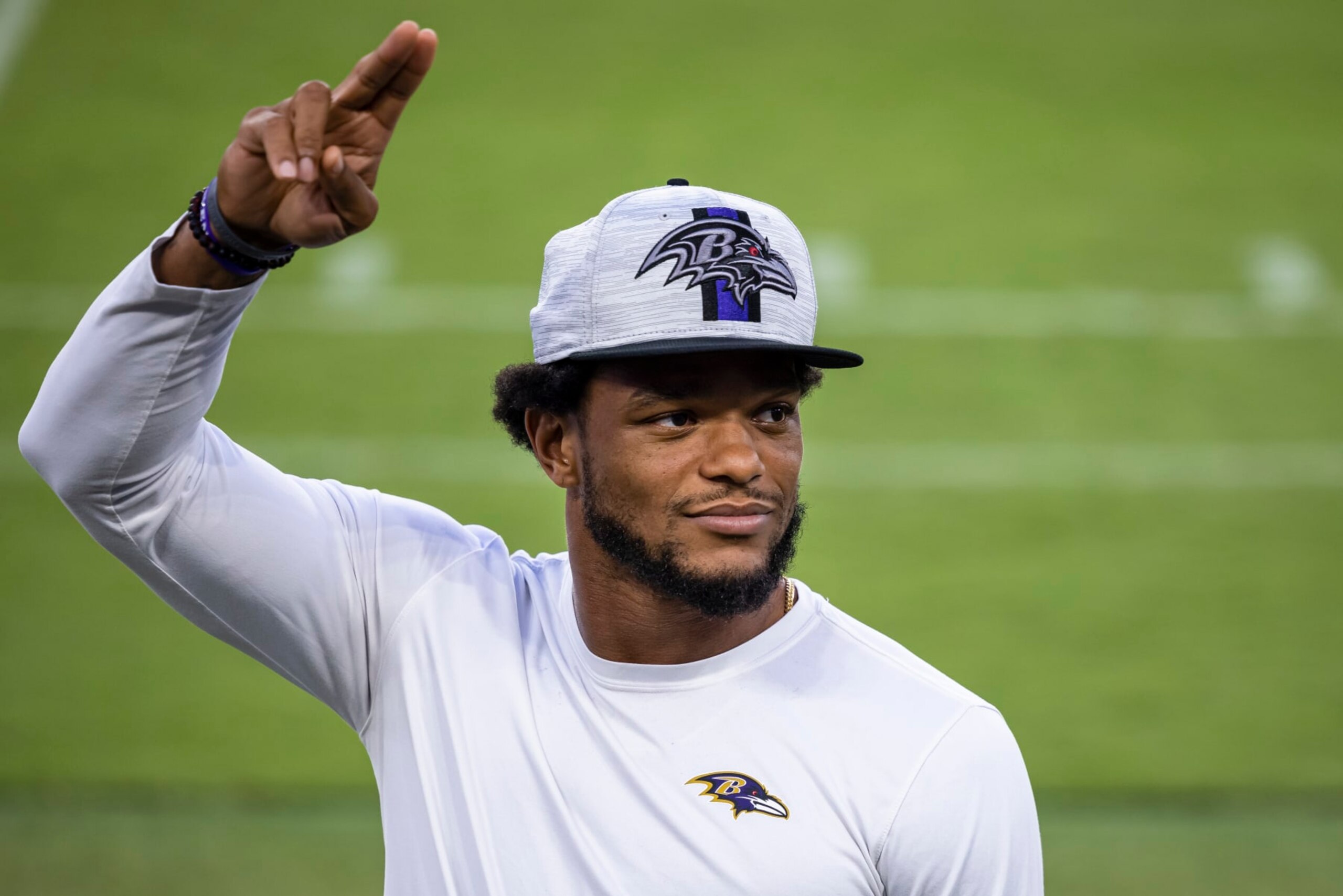 BALTIMORE, MD - JULY 31: Jimmy Smith #22 of the Baltimore Ravens salutes fans during training camp at M&T Bank Stadium on July 31, 2021 in Baltimore, Maryland. (Photo by Scott Taetsch/Getty Images)