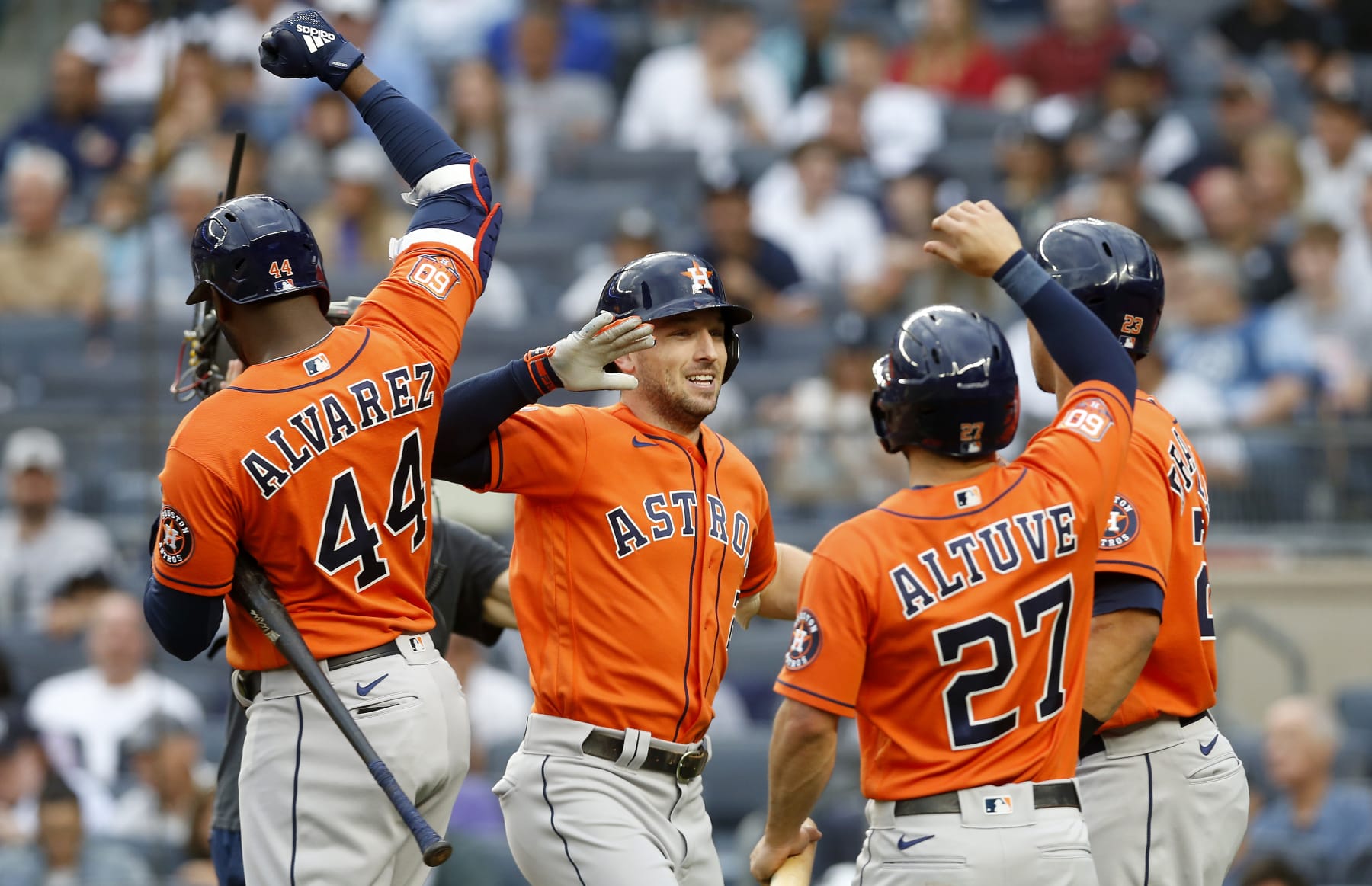 NEW YORK, NEW YORK - JUNE 23:  Alex Bregman #2 of the Houston Astros celebrates his first inning three run home run against the New York Yankees with teammates Yordan Alvarez #44, Jose Altuve #27 and Michael Brantley #23 at Yankee Stadium on June 23, 2022 in New York City. (Photo by Jim McIsaac/Getty Images)