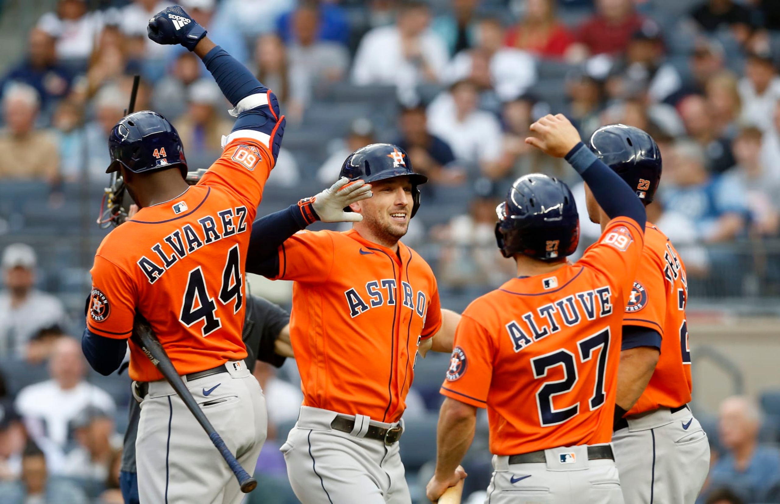 NEW YORK, NEW YORK - JUNE 23:  Alex Bregman #2 of the Houston Astros celebrates his first inning three run home run against the New York Yankees with teammates Yordan Alvarez #44, Jose Altuve #27 and Michael Brantley #23 at Yankee Stadium on June 23, 2022 in New York City. (Photo by Jim McIsaac/Getty Images)