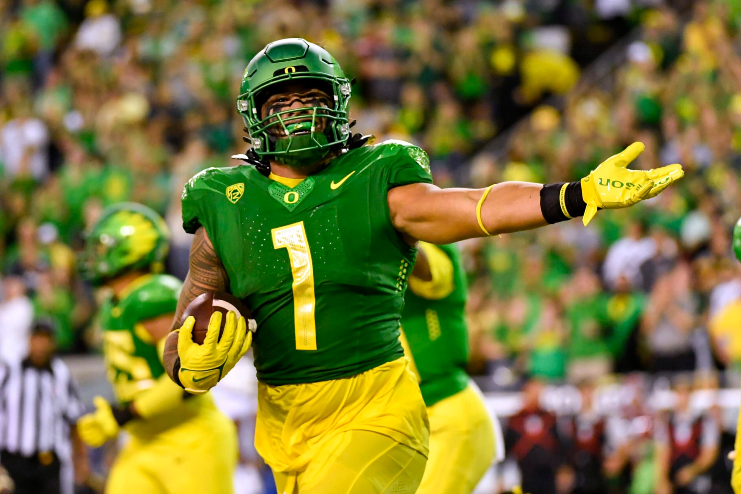 Oregon linebacker Noah Sewell (1) celebrates after recovering a Stanford fumble during the first half of an NCAA college football game Saturday, Oct. 1, 2022, in Eugene, Ore. (AP Photo/Andy Nelson)