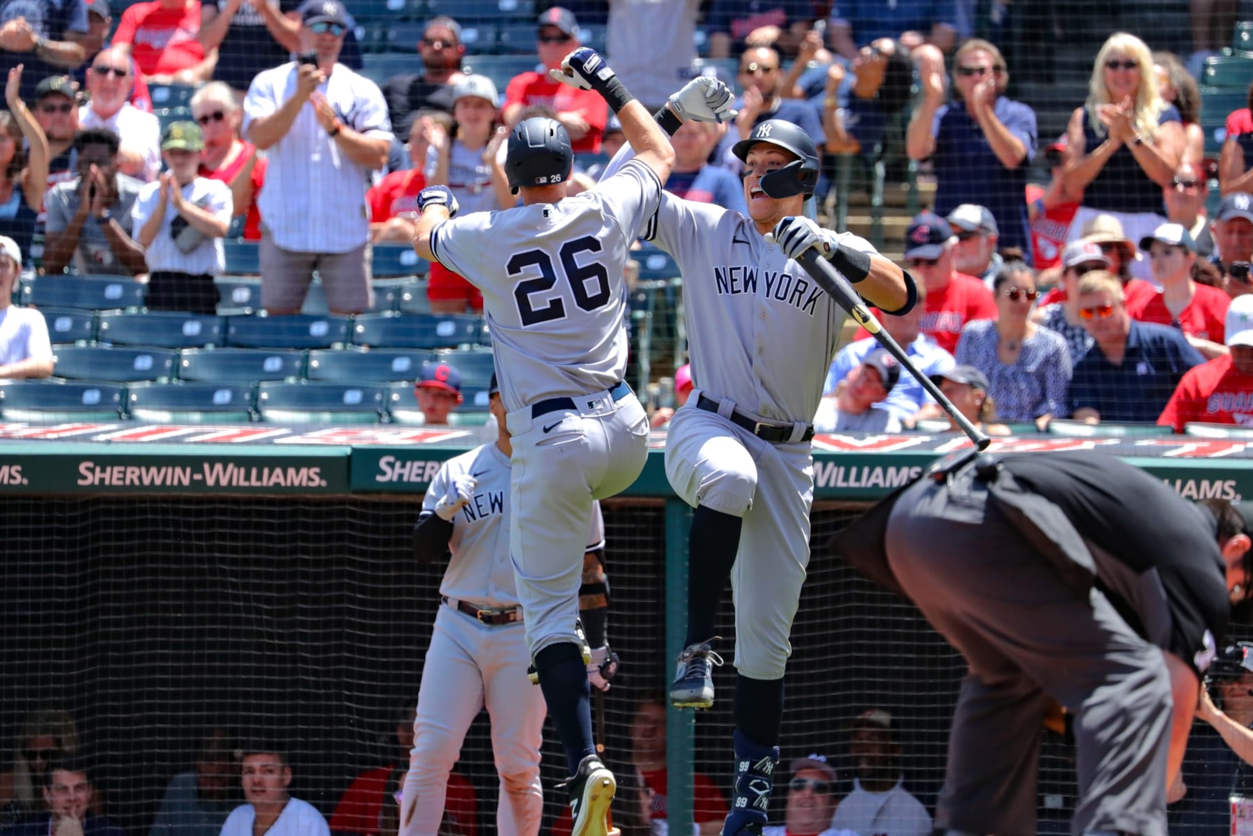 CLEVELAND, OH - JULY 02: New York Yankees third baseman DJ LeMahieu (26) and New York Yankees designated hitter Aaron Judge (99) celebrates after LeMahieu hit a home run during the third inning of game 1 of the Major League Baseball doubleheader between the New York Yankees and Cleveland Guardians on July 2, 2022, at Progressive Field in Cleveland, OH. (Photo by Frank Jansky/Icon Sportswire via Getty Images)