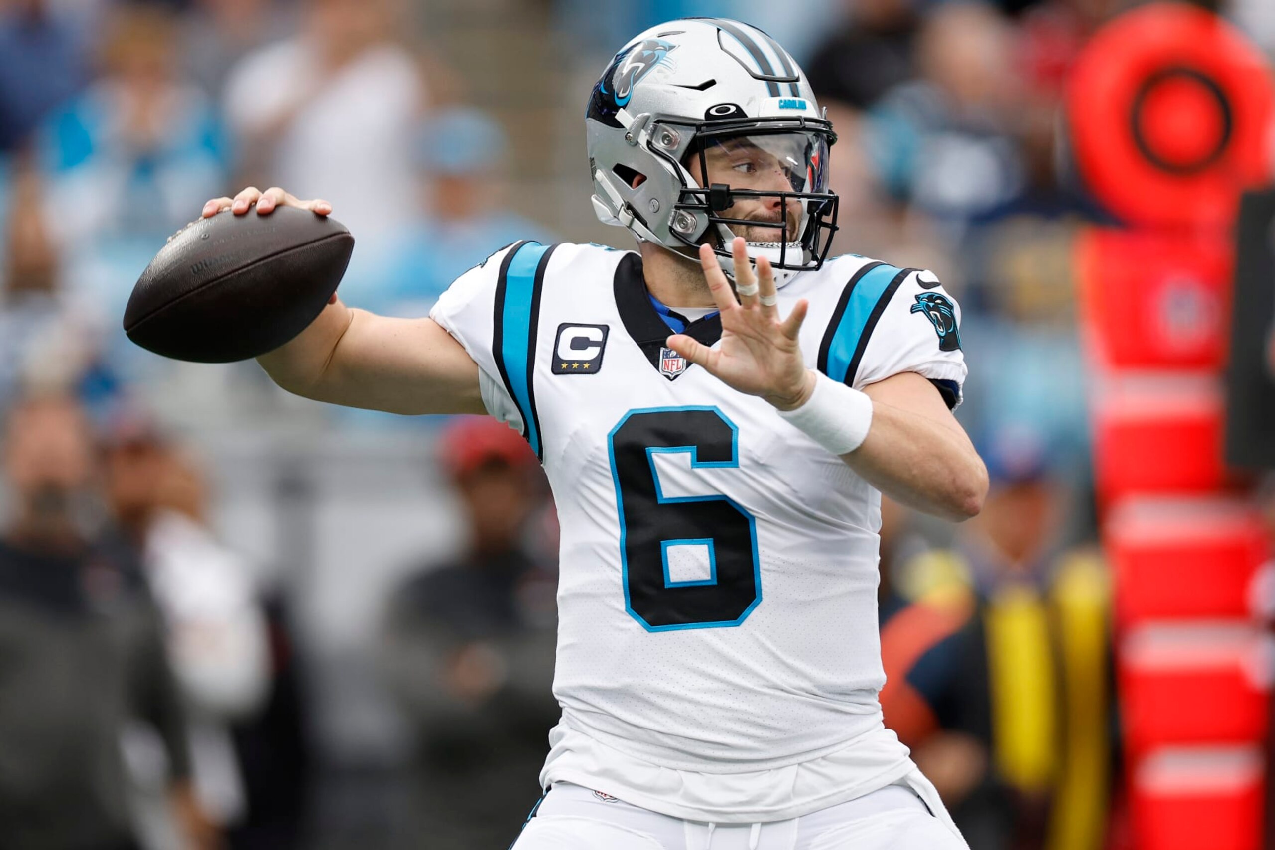 CHARLOTTE, NORTH CAROLINA - OCTOBER 02: Baker Mayfield #6 of the Carolina Panthers looks for a pass against the Arizona Cardinals during the first quarter at Bank of America Stadium on October 02, 2022 in Charlotte, North Carolina. (Photo by Jared C. Tilton/Getty Images)