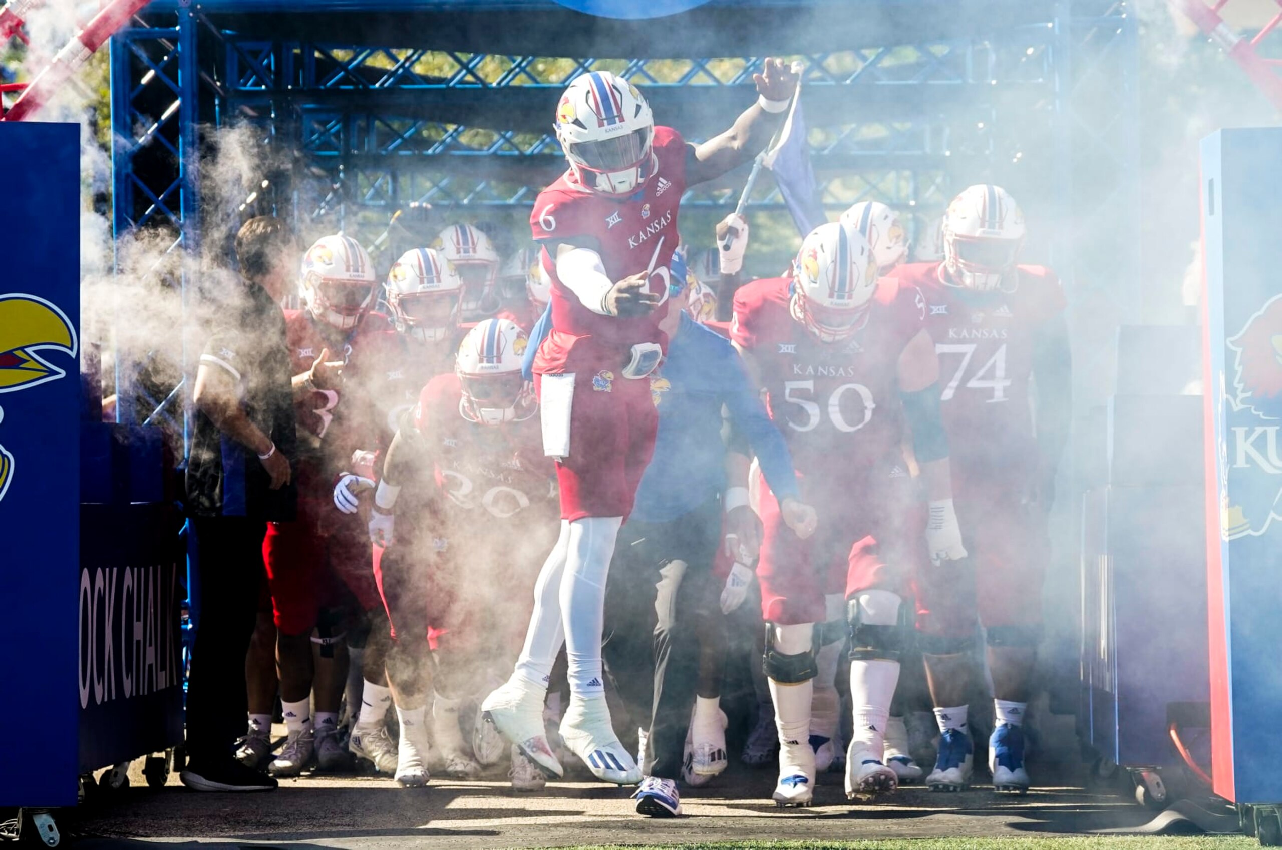 LAWRENCE, KS - SEPTEMBER 24: Jalon Daniels #6 of the Kansas Jayhawks leads the team onto the field before a game against the Duke Blue Devils at David Booth Kansas Memorial Stadium on September 24, 2022 in Lawrence, Kansas. (Photo by Jay Biggerstaff/Getty Images) LAWRENCE, KS - SEPTEMBER 24: Jalon Daniels #6 of the Kansas Jayhawks leads the team onto the field before a game against the Duke Blue Devils at David Booth Kansas Memorial Stadium on September 24, 2022 in Lawrence, Kansas. (Photo by Jay Biggerstaff/Getty Images)