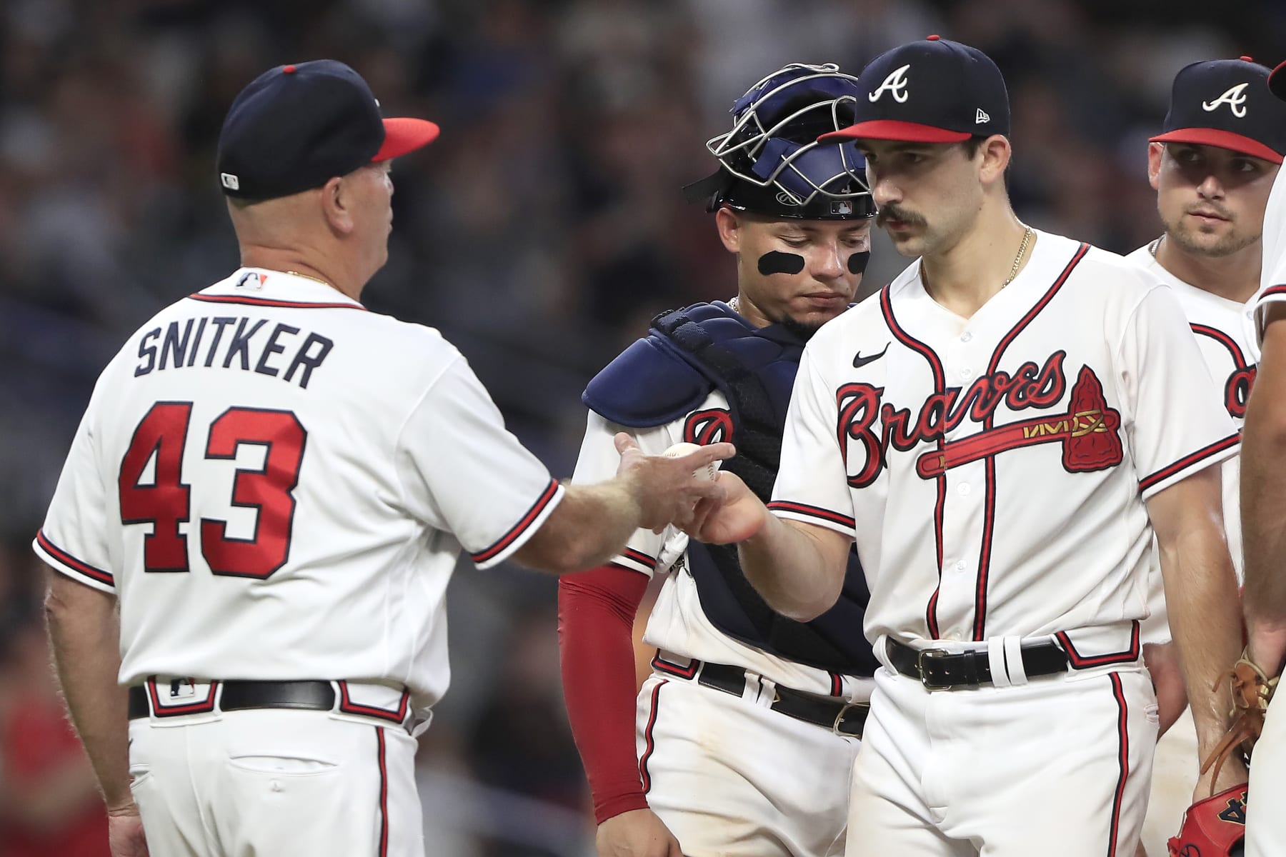 ATLANTA, GA - AUGUST 02: Atlanta Braves manager Brian Snitker (43) relieves Atlanta Braves starting pitcher Spencer Strider (65) of his pitching duties during the Tuesday evening MLB game between the Atlanta Braves and the Philadelphia Phillies on August 2, 2022 at Truist Park in Atlanta, Georgia.  (Photo by David J. Griffin/Icon Sportswire via Getty Images)