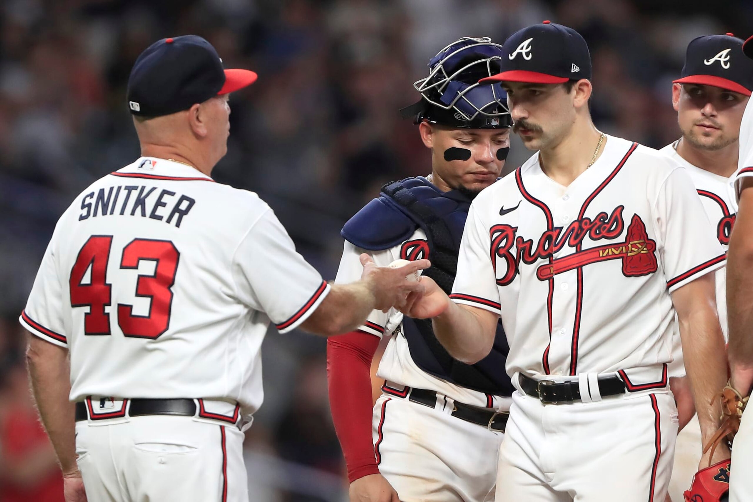 ATLANTA, GA - AUGUST 02: Atlanta Braves manager Brian Snitker (43) relieves Atlanta Braves starting pitcher Spencer Strider (65) of his pitching duties during the Tuesday evening MLB game between the Atlanta Braves and the Philadelphia Phillies on August 2, 2022 at Truist Park in Atlanta, Georgia.  (Photo by David J. Griffin/Icon Sportswire via Getty Images)