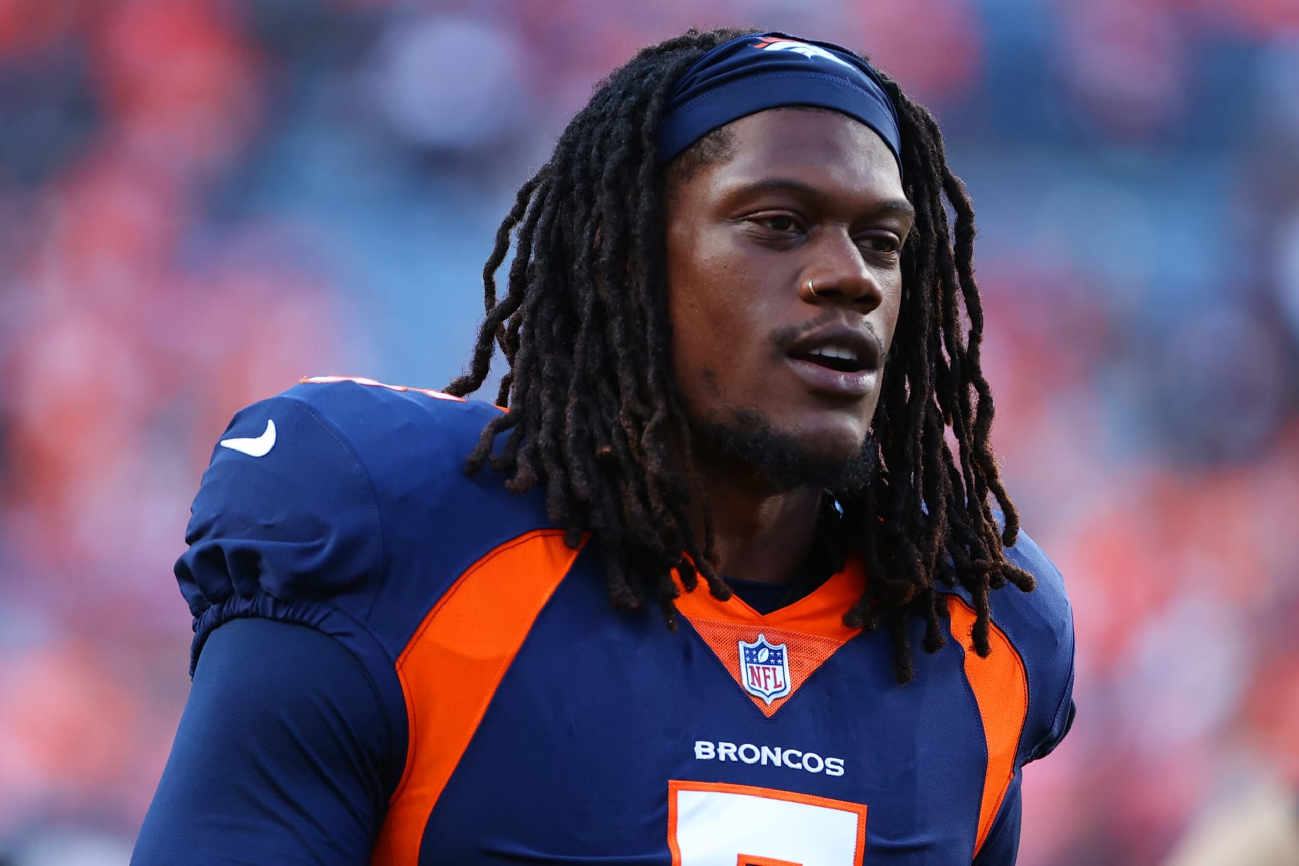 DENVER, CO - SEPTEMBER 25: Randy Gregory #5 of the Denver Broncos warms up against the San Francisco 49ers at Empower Field At Mile High on September 25, 2022 in Denver, Colorado. (Photo by Jamie Schwaberow/Getty Images) DENVER, CO - SEPTEMBER 25: Randy Gregory #5 of the Denver Broncos warms up against the San Francisco 49ers at Empower Field At Mile High on September 25, 2022 in Denver, Colorado. (Photo by Jamie Schwaberow/Getty Images)