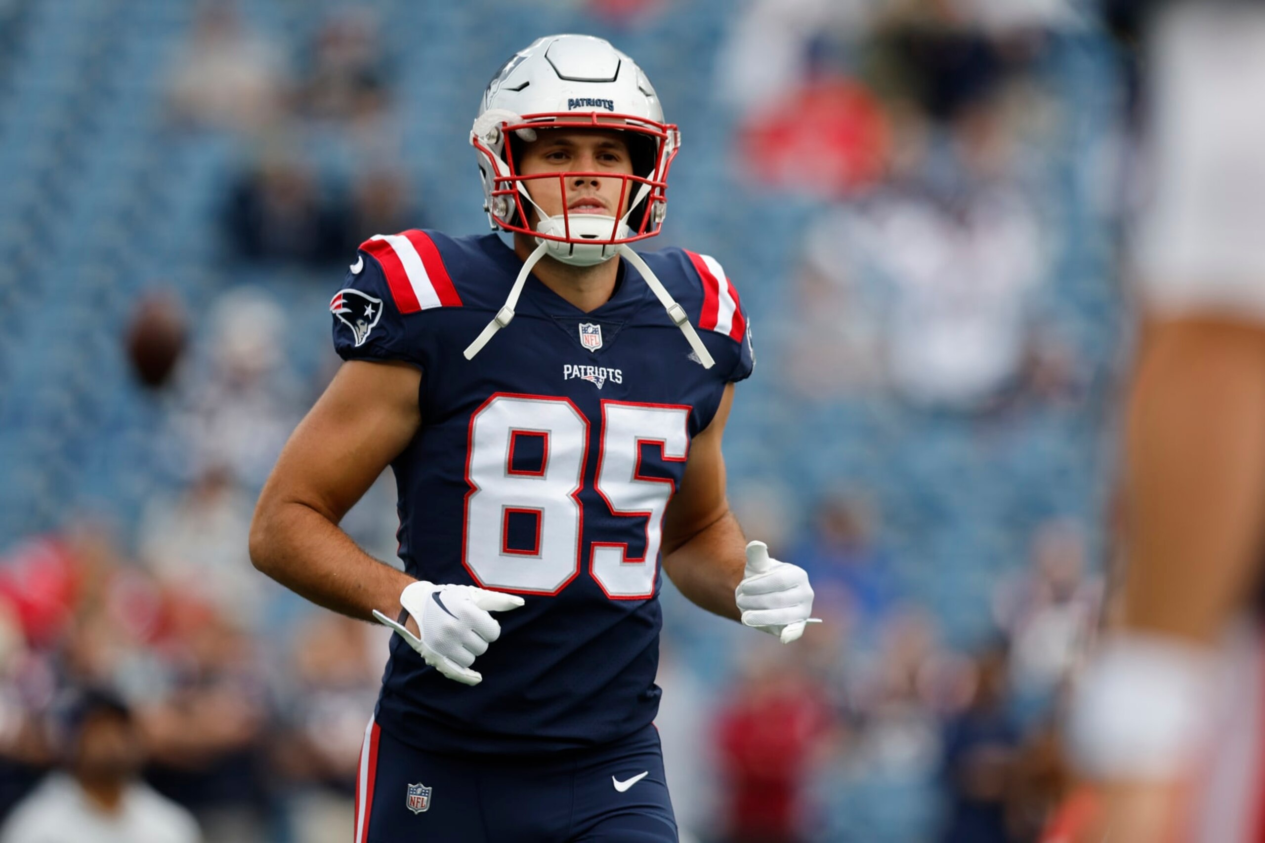 New England Patriots tight end Hunter Henry (85) warms up prior to an NFL football game between the Baltimore Ravens and the Patriots, Sunday, Sept. 25, 2022, in Foxborough, Mass. (AP Photo/Michael Dwyer)