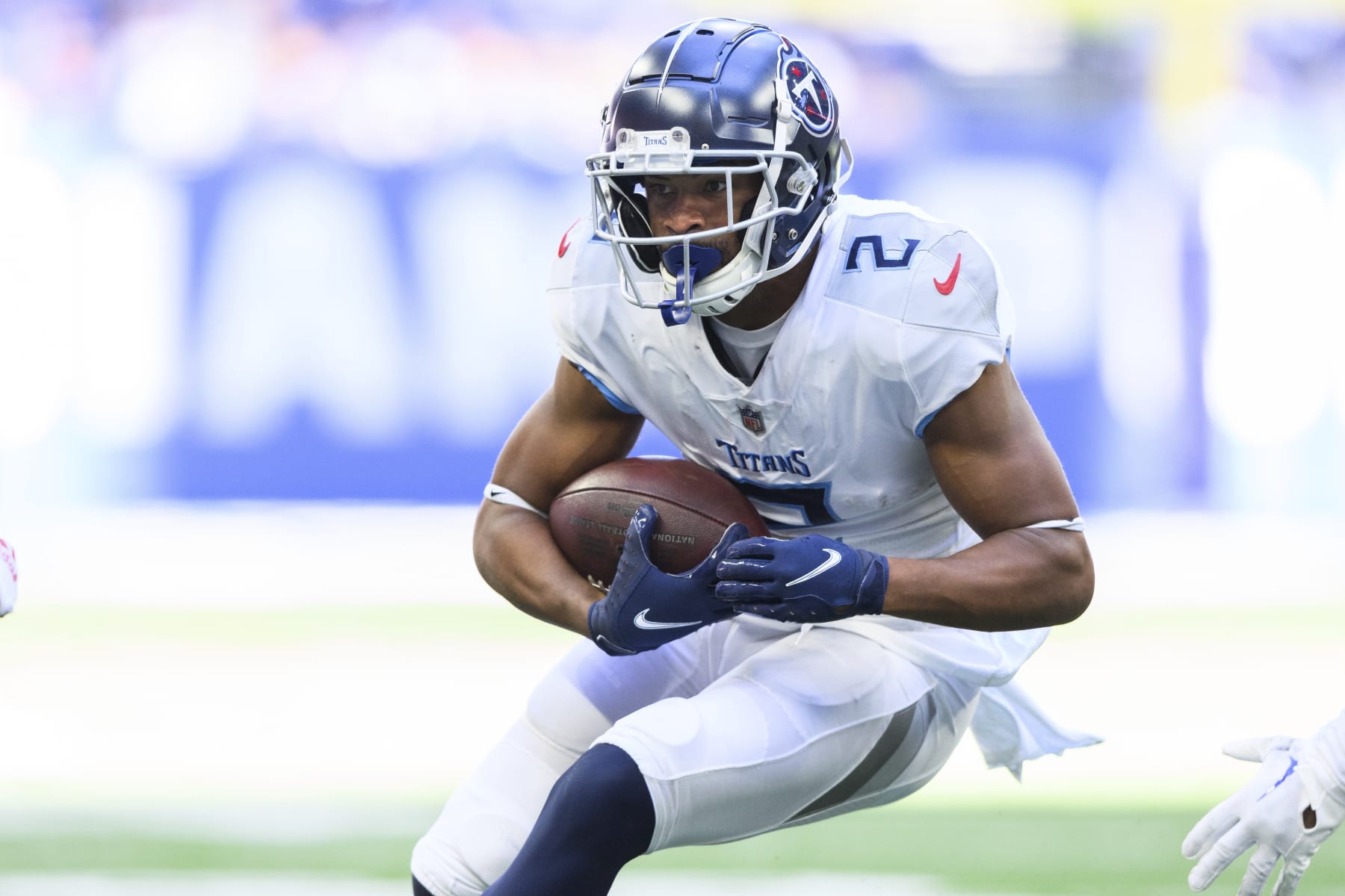 Tennessee Titans wide receiver Robert Woods (2) runs down the field after a catch during an NFL football game against the Indianapolis Colts, Sunday, Oct. 2, 2022, in Indianapolis. (AP Photo/Zach Bolinger)